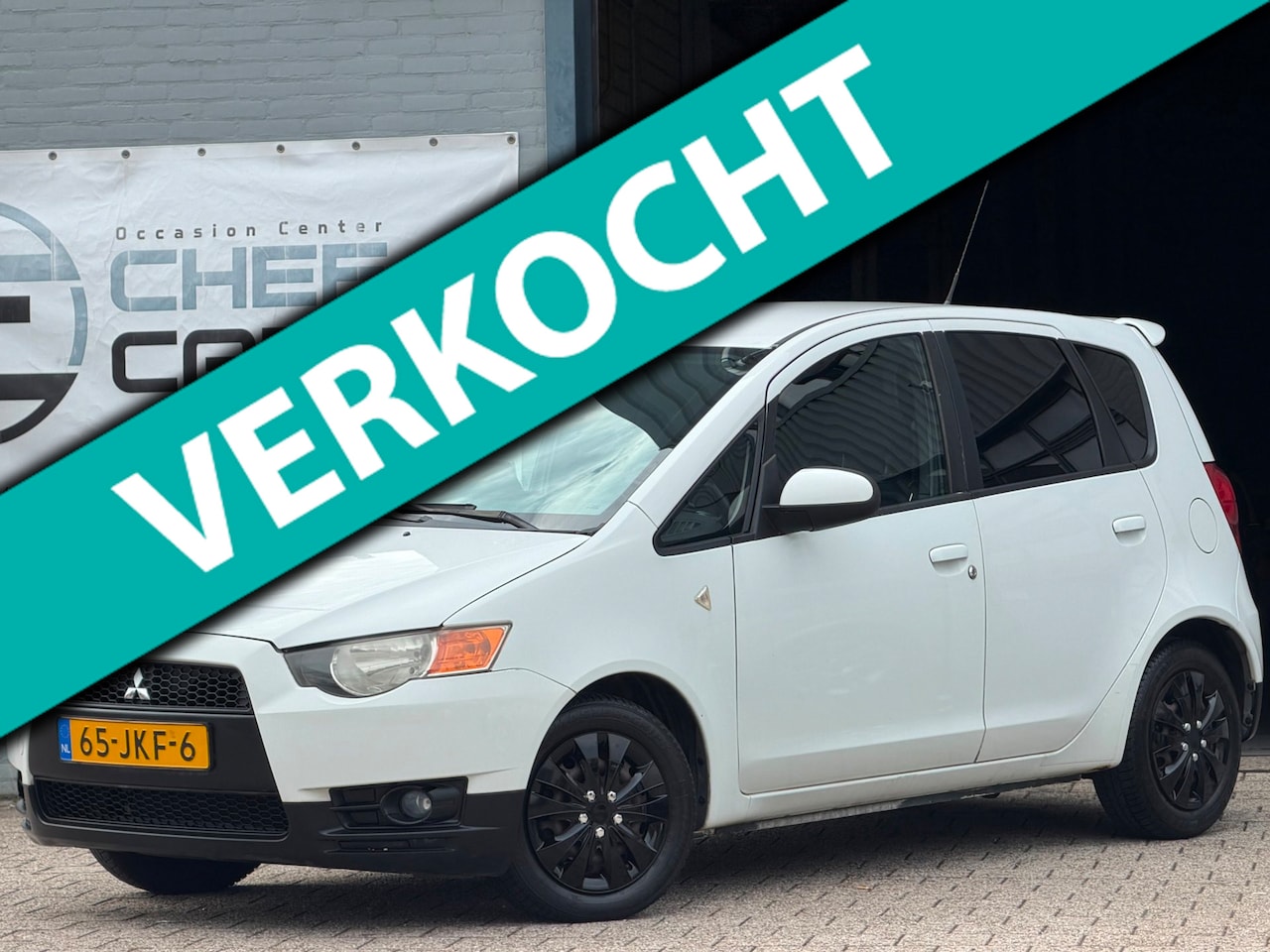 Mitsubishi Colt - 1.3|NAP|AIRCO|CRUISE|5D|NAVI|AUDIO|1EIGENAAR! - AutoWereld.nl