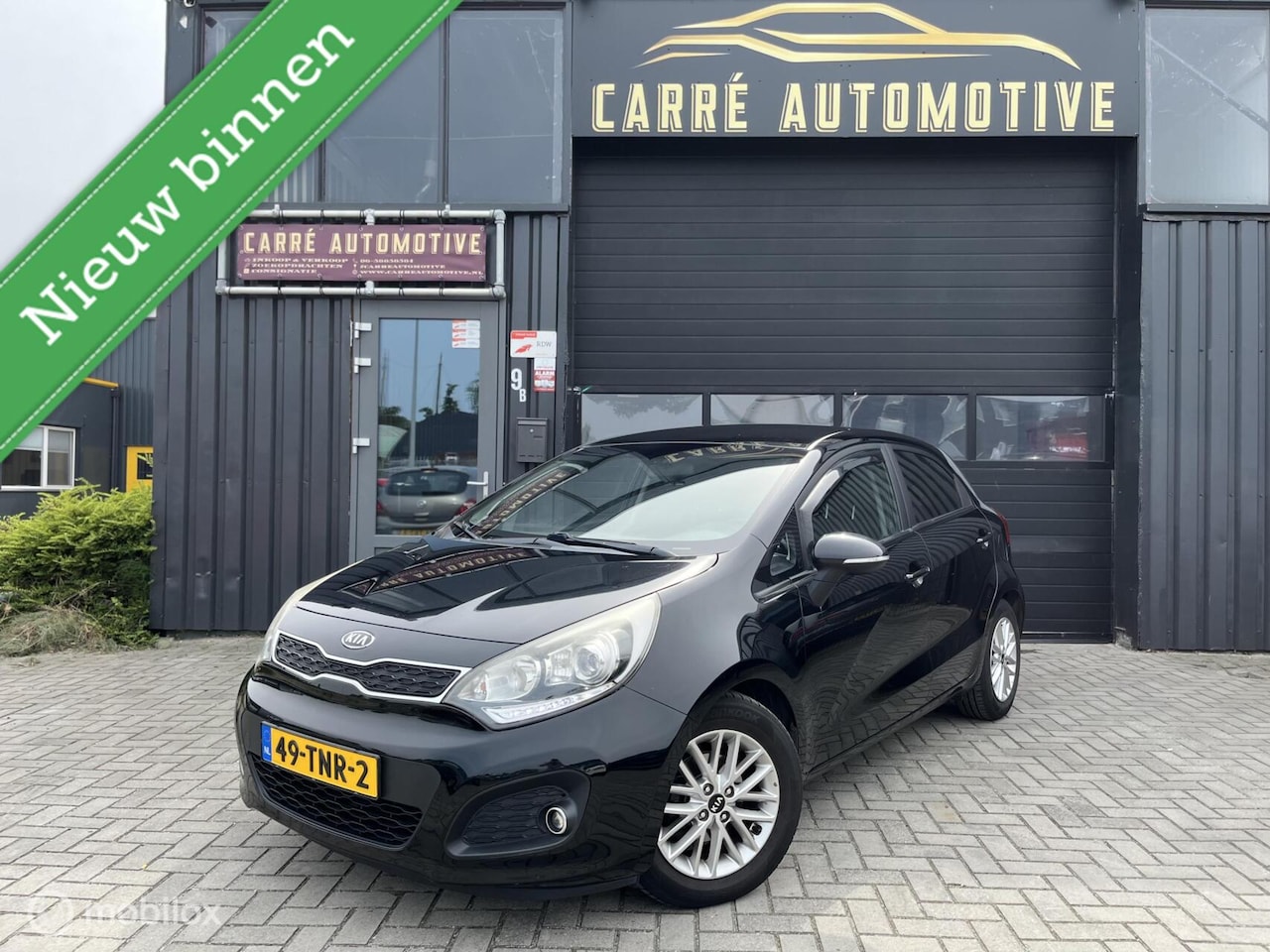 Kia Rio - 1.2 CVVT Super Pack|NAP|Cruise|Parkeersensoren|Navi|Trekhaak - AutoWereld.nl