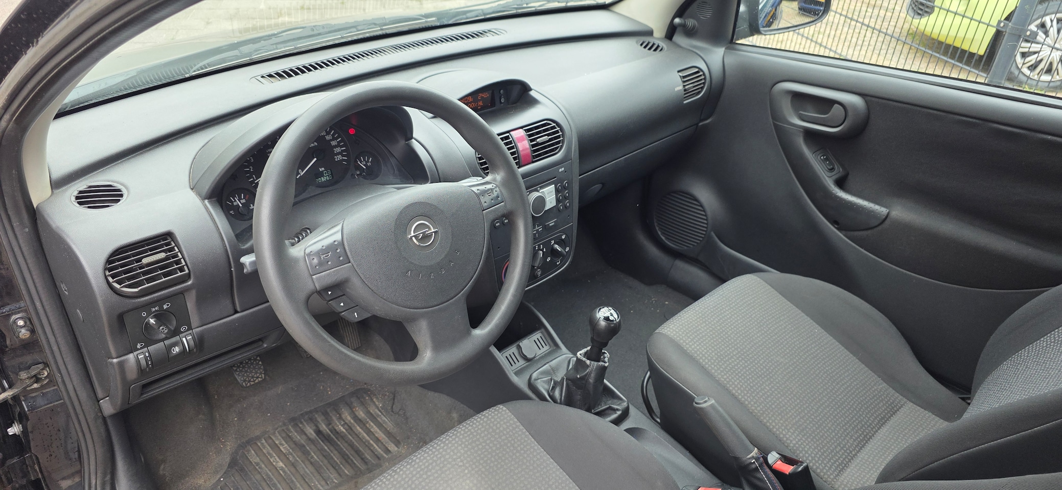 Opel Corsa - 1.0-12V Rhythm