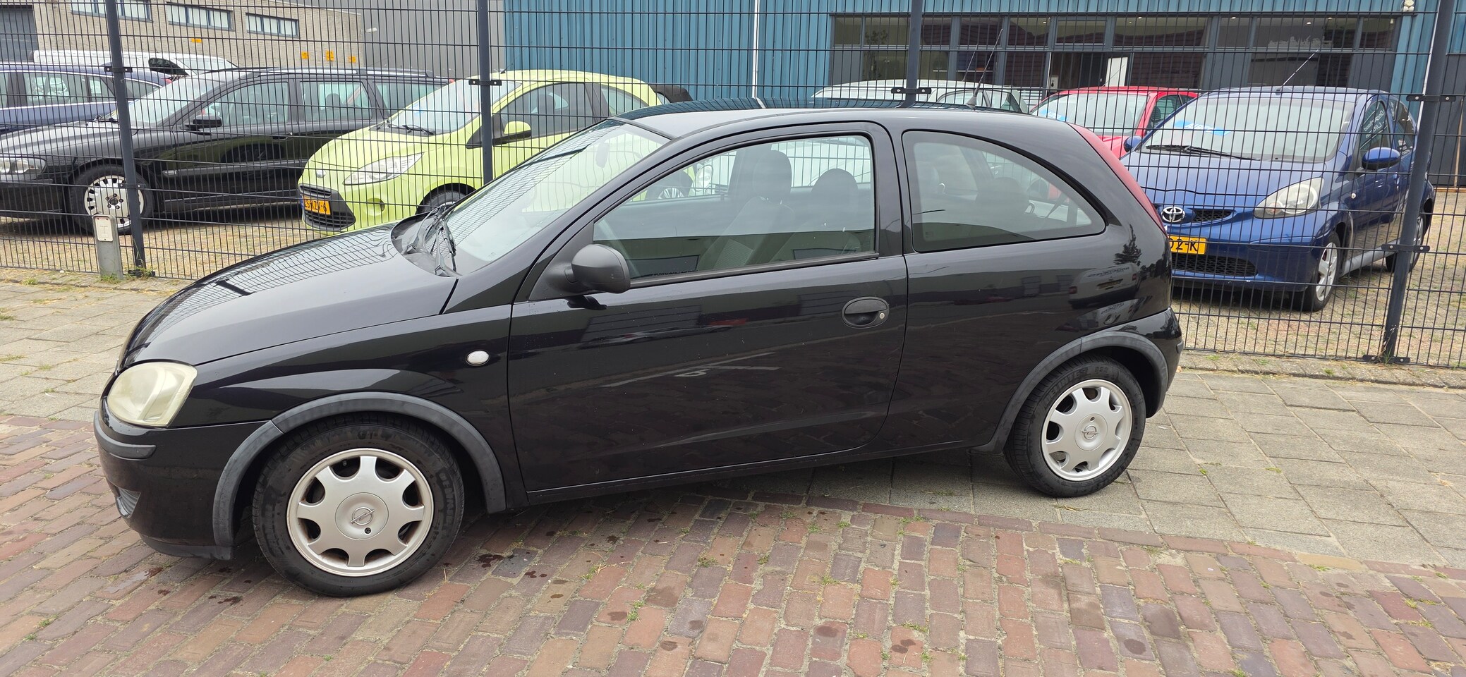 Opel Corsa - 1.0-12V Rhythm