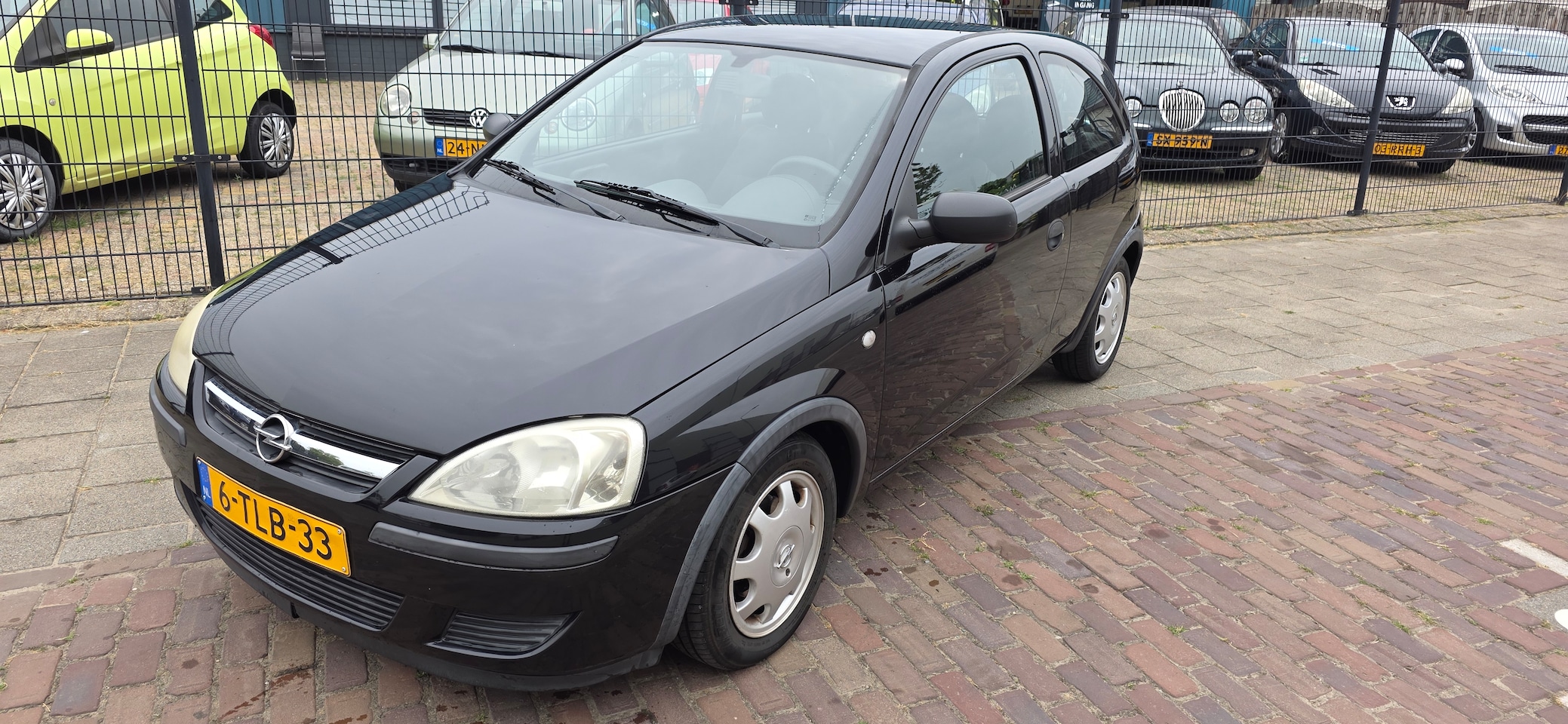 Opel Corsa - 1.0-12V Rhythm