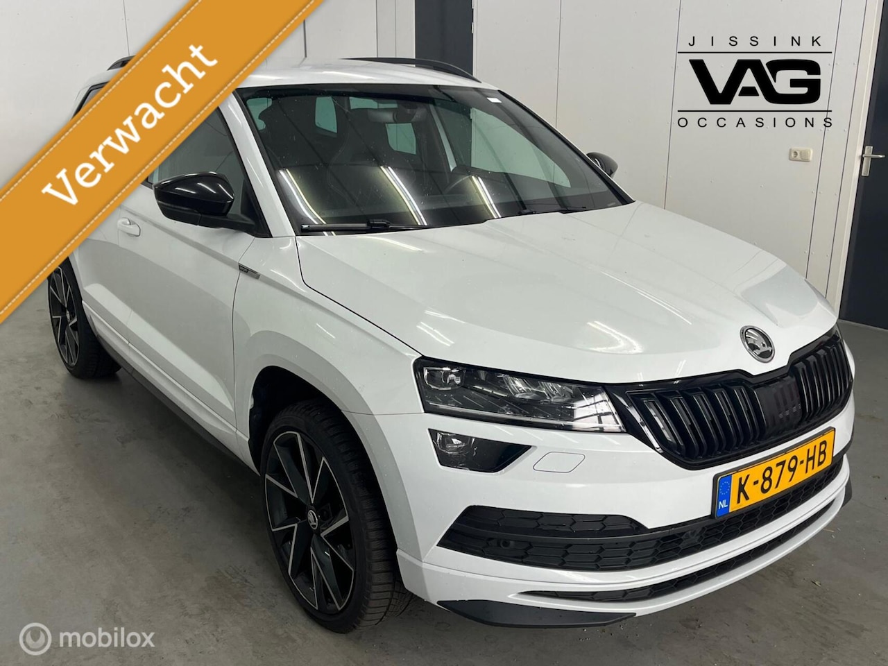 Skoda Karoq - 1.5 TSI Sportline Automaat Trekhaak Canton Camera LED - AutoWereld.nl