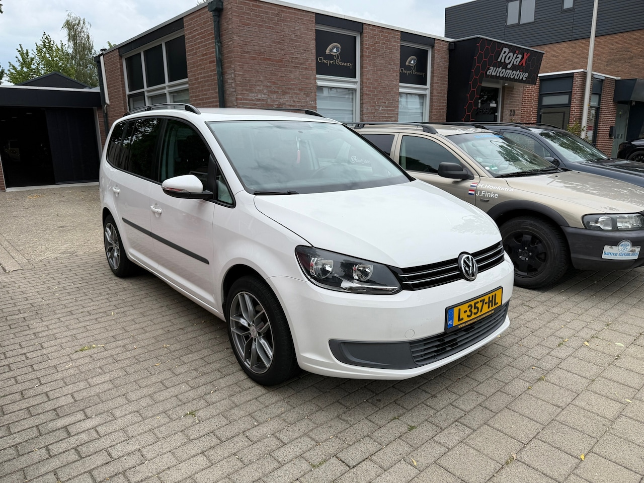 Volkswagen Touran - 1.2 TSI Easyline AIRCO - TREKHAAK - NAVI - NWE APK. - AutoWereld.nl