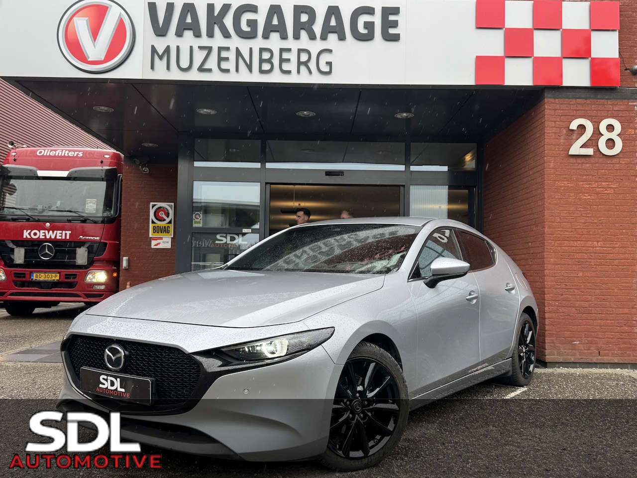 Mazda 3 - 2.0 e-SkyActiv-X M Hybrid 180PK!! Comfort // BOSE PREMIUM AUDIO // NAVI // CAMERA // ADAPT - AutoWereld.nl