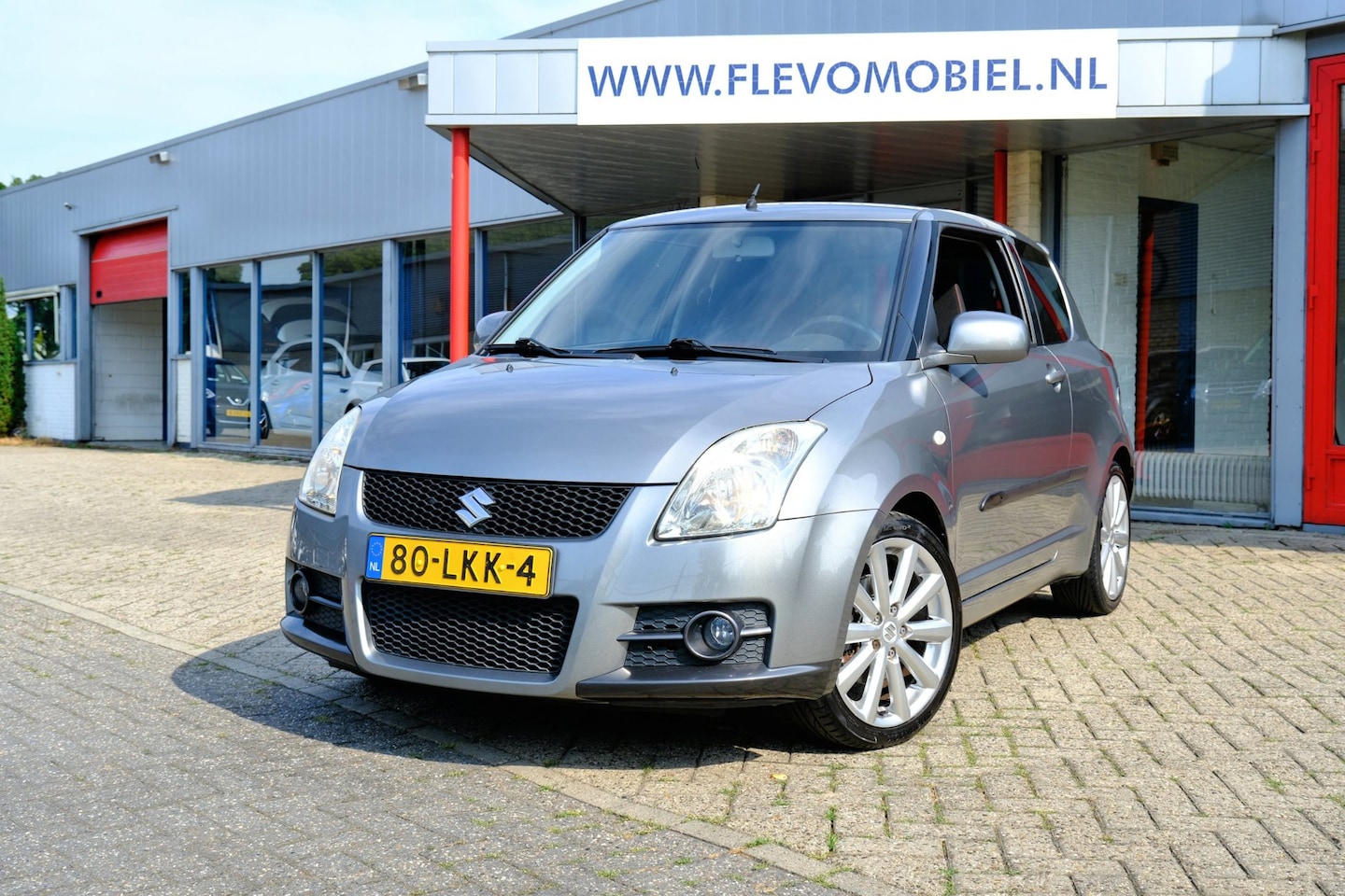 Suzuki Swift - 1.6 Sport Airco|Sportstoelen|Navi via Android - AutoWereld.nl