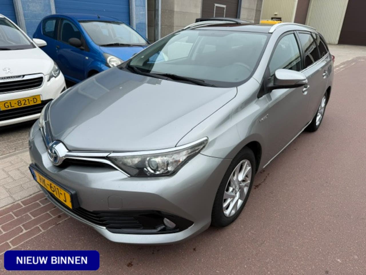 Toyota Auris Touring Sports - 1.8 Hybrid BTW-car 11-2015 NAP 291.607km Panoramaroof Prima BTW-auto van de 2e eigenaar me - AutoWereld.nl