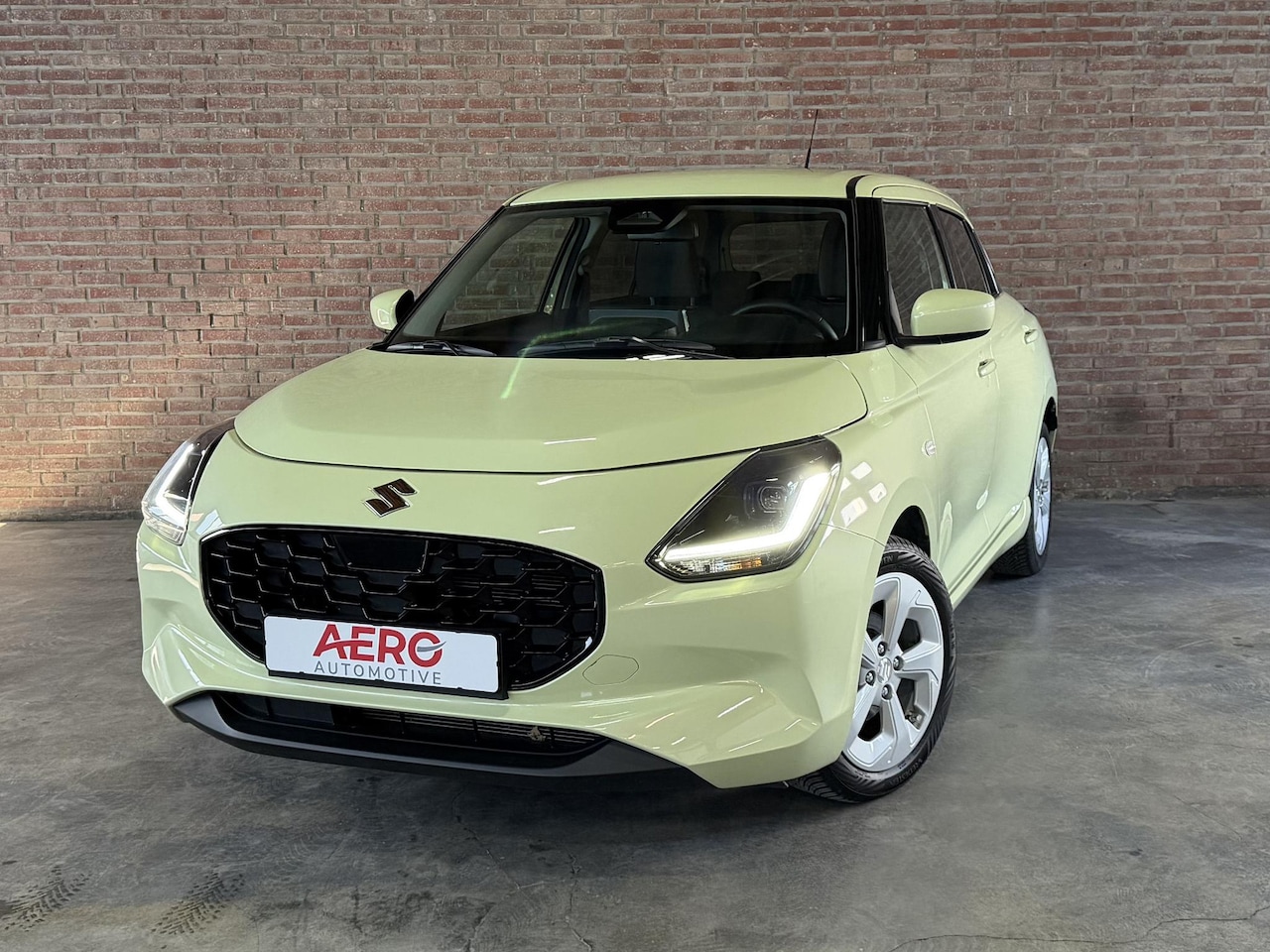 Suzuki Swift - 1.2 HYBRID MT Comfort Camera / Navi / Clima - AutoWereld.nl
