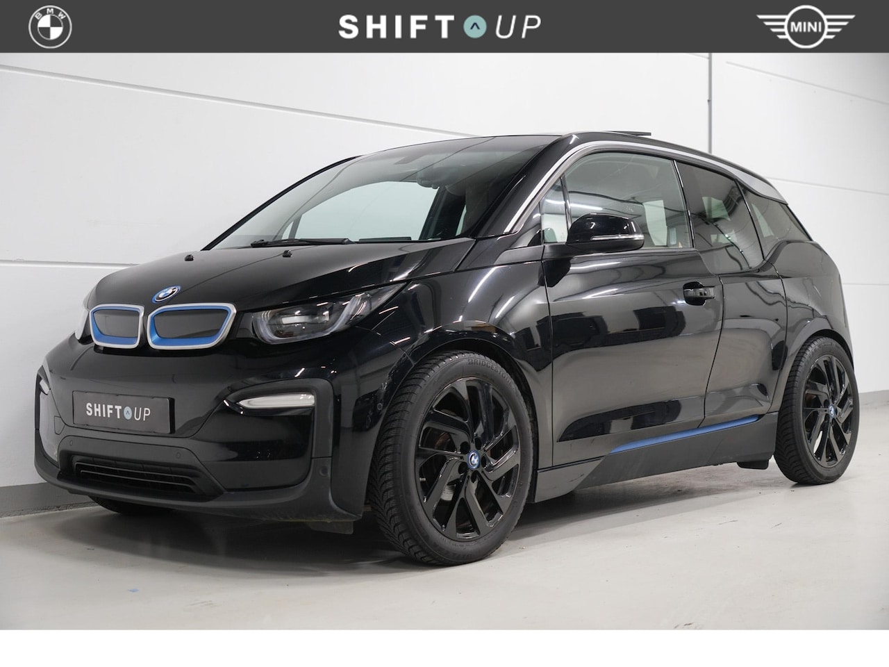 BMW i3 - 94Ah 33 kWh Schuifdak | Harman Kardon | Camera - AutoWereld.nl