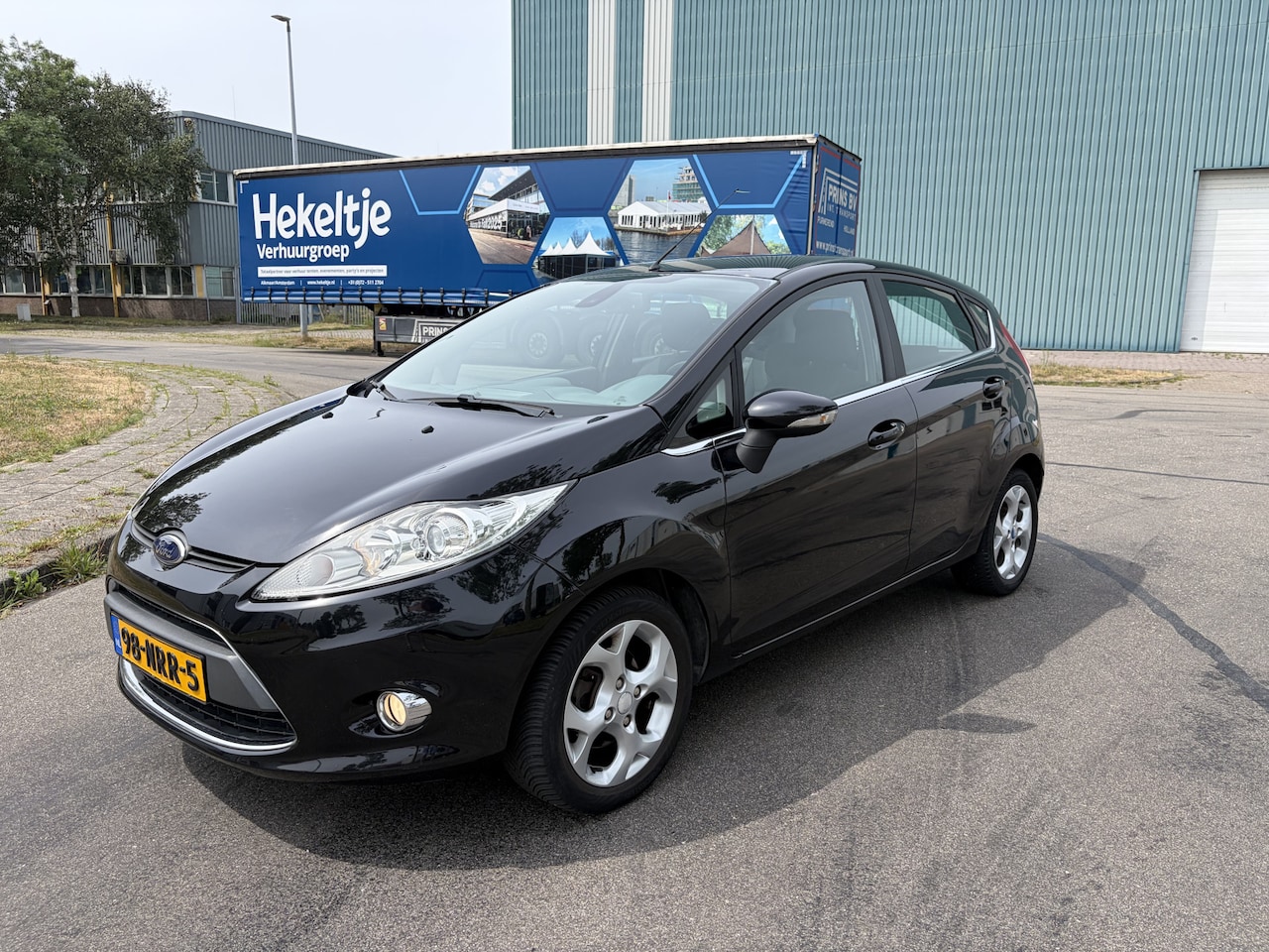 Ford Fiesta - 1.25i Titanium 5-Deurs 82 PK. Leuke en zeer fijn rijdende auto met goed onderhoud in het v - AutoWereld.nl