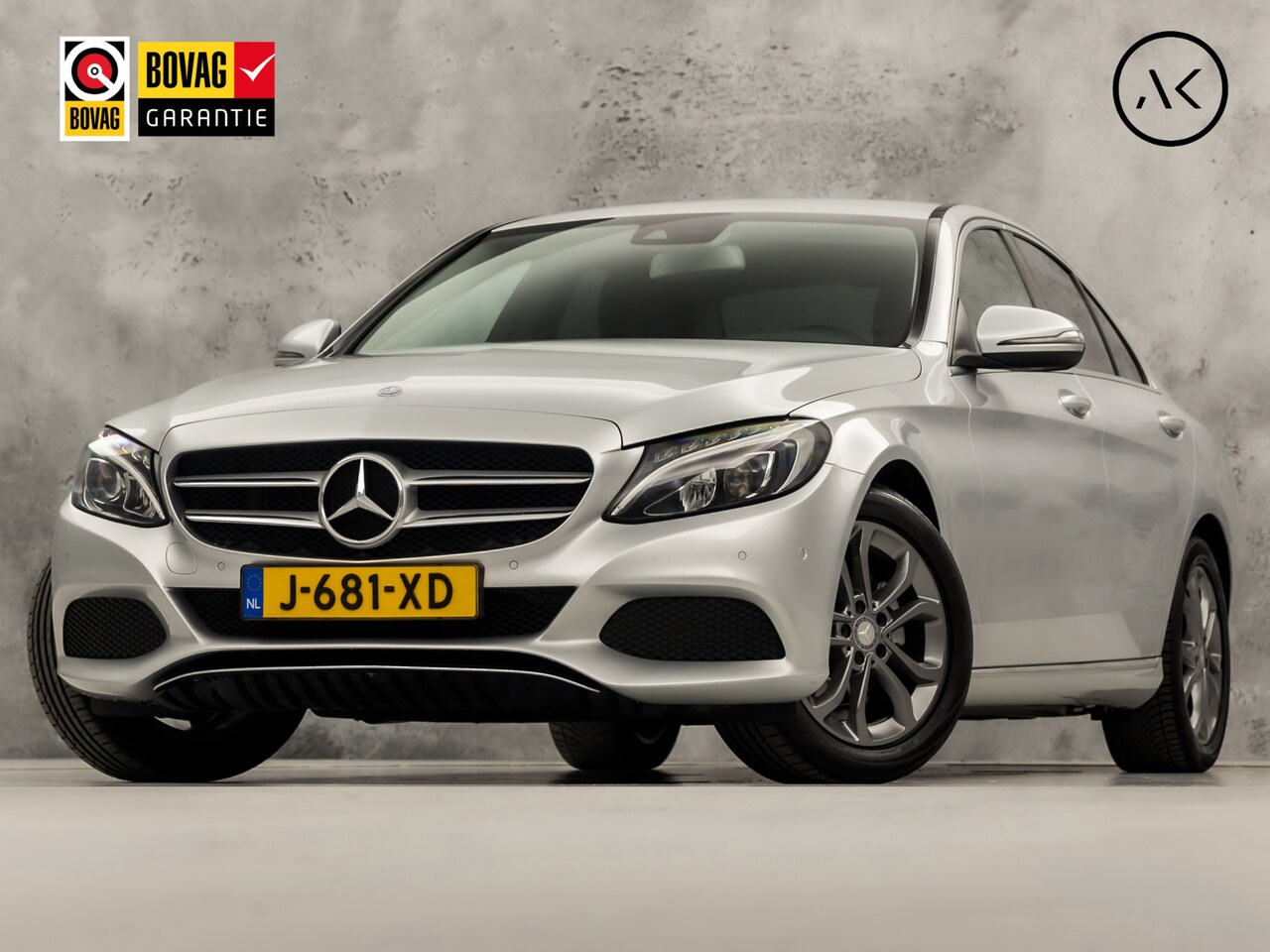 Mercedes-Benz C-klasse - 180 Sport 156Pk Automaat (NAVIGATIE, LEDER, SFEERVERLICHTING, GETINT GLAS, STOELVERWARMING - AutoWereld.nl