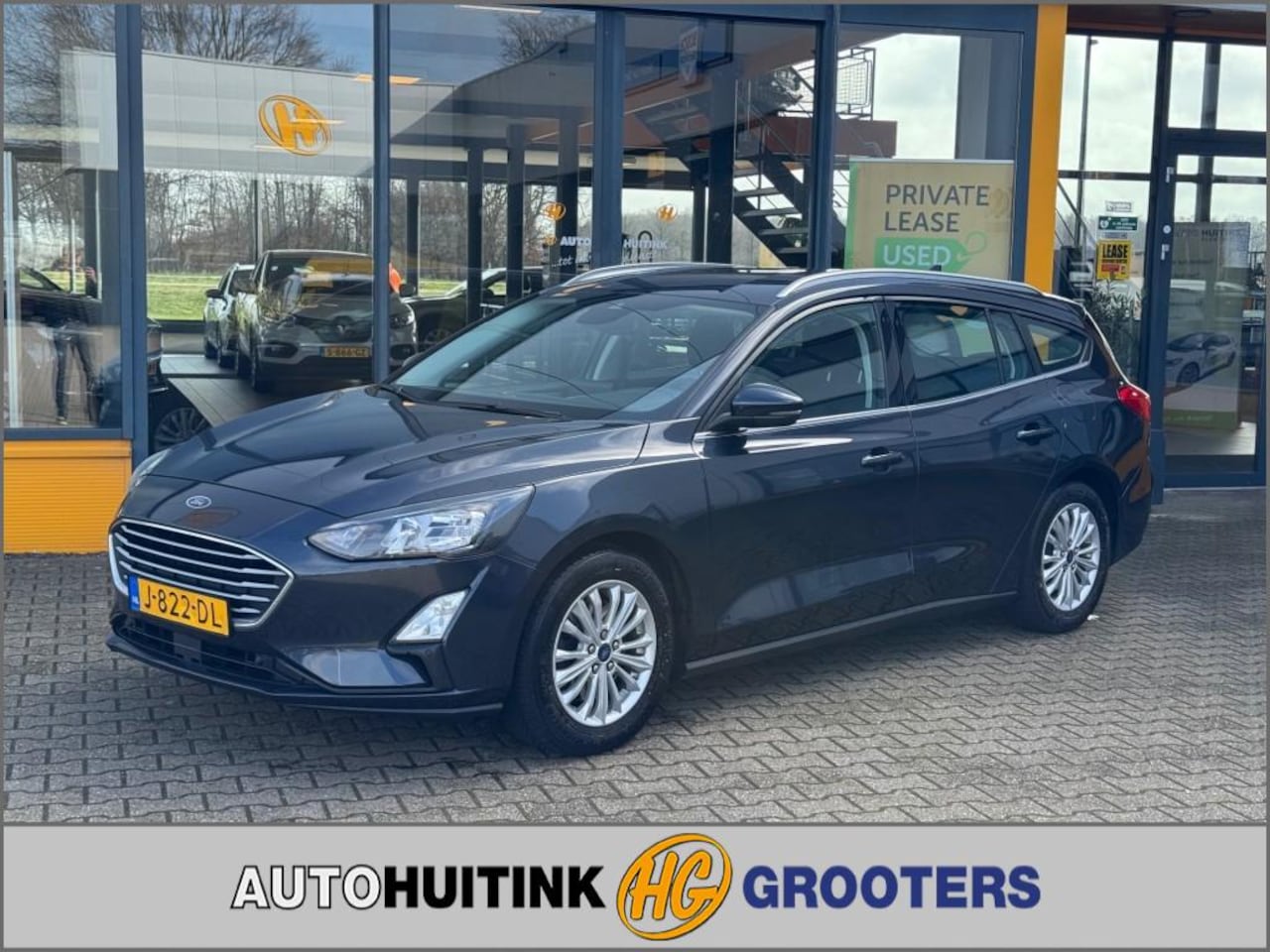 Ford Focus - 1.0 EcoBoost Titanium - navi - sensoren- trekhaak - AutoWereld.nl