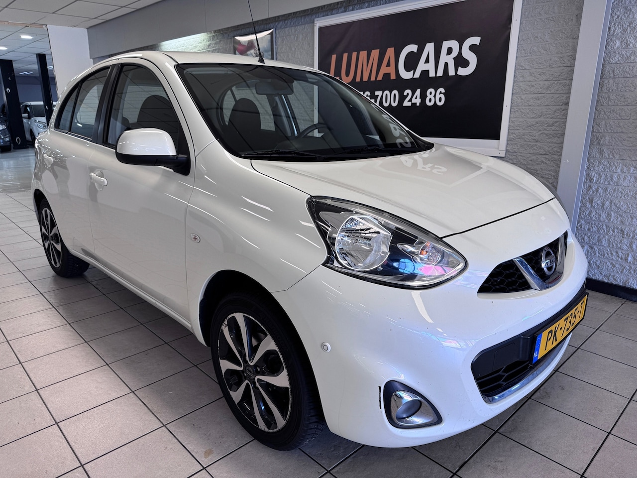 Nissan Micra - 1.2 Tekna | Cruise | PDC | Navi | Clima | Airco - AutoWereld.nl