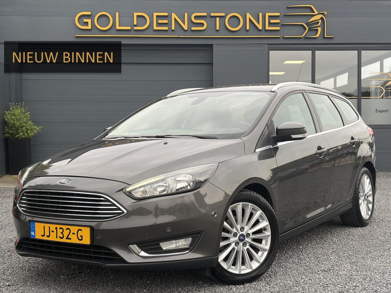 Ford Focus Wagon - 1.0 Titanium 2e Eigenaar,Trekhaak,Navi,125pk,PDC V+A,6 Bak,Clima,Cruise,N.A.P,Apk tot 04-2 - AutoWereld.nl