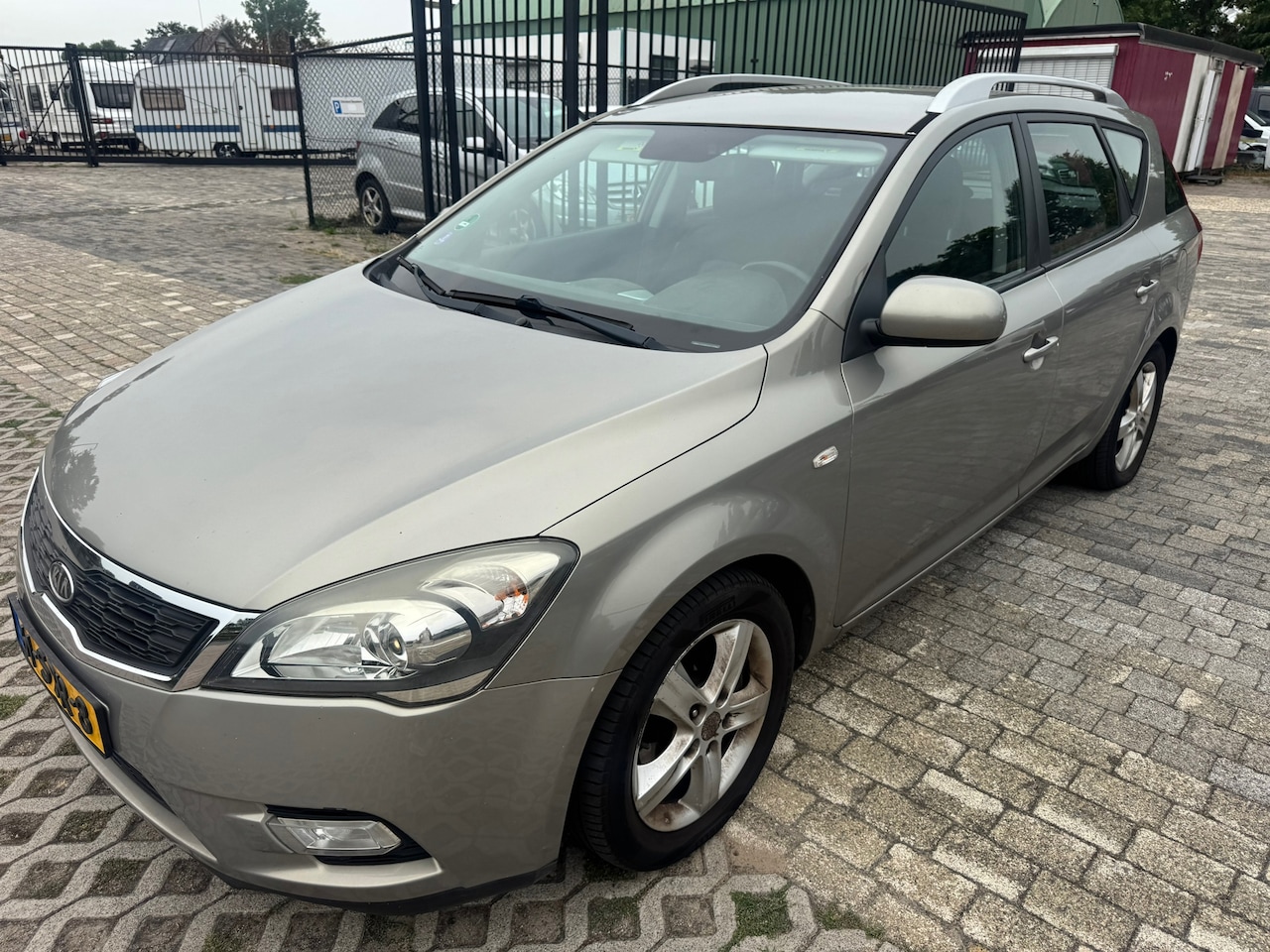 Kia Cee'd Sporty Wagon - 1.4 CVVT Navigator Plus Pack 1.4 CVVT Navigator Plus Pack - AutoWereld.nl