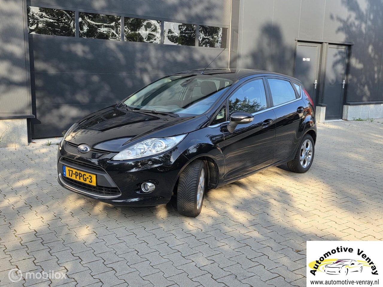 Ford Fiesta - 1.25 Ghia 1.25 Ghia - AutoWereld.nl