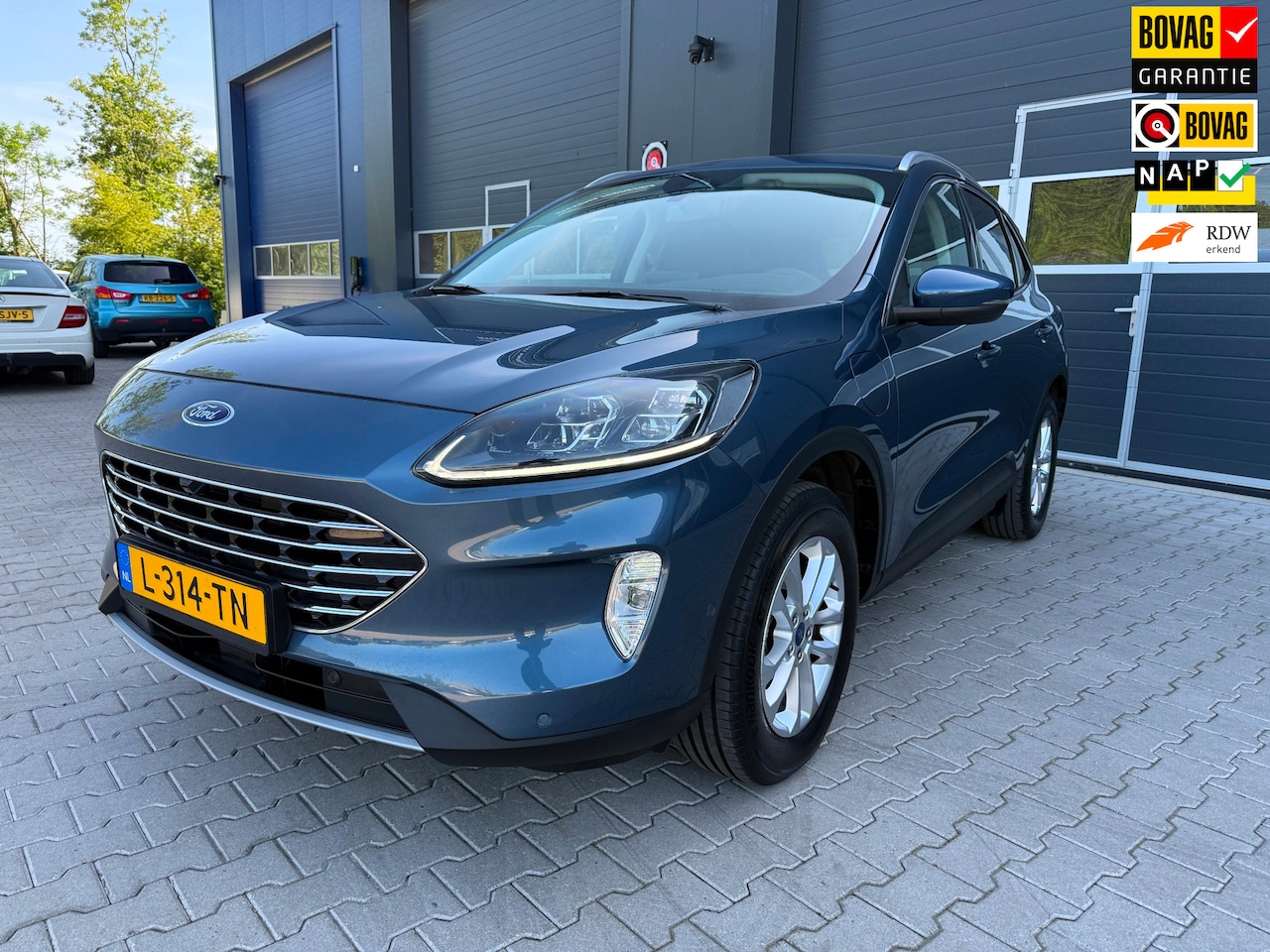 Ford Kuga - 2.5 PHEV Titanium X DRIVER ASS. EN WINTER PACK - AutoWereld.nl