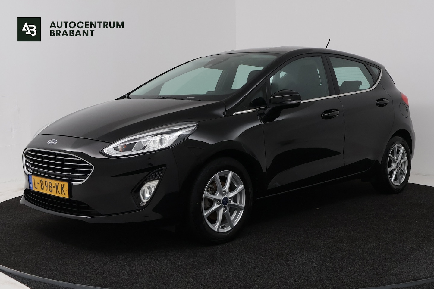 Ford Fiesta - 1.0 EcoBoost Titanium (NAVIGATIE, CLIMA, PARKEERSENSOREN, 1e EIGENAAR, GOED ONDERHOUDEN) - AutoWereld.nl