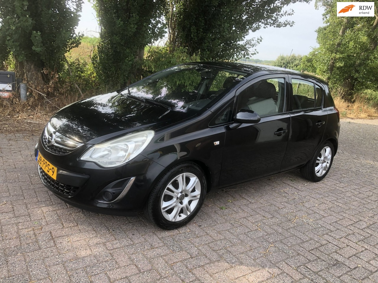 Opel Corsa - 1.4-16V Cosmo automaat Eerste eigenaar - AutoWereld.nl