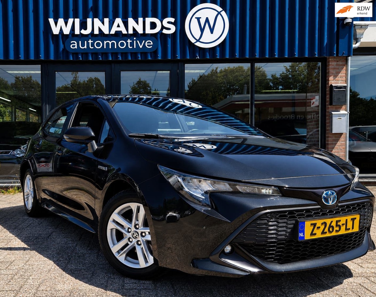 Toyota Corolla - 1.8 Hybrid Active Automaat Stoelvw Camera PDC - AutoWereld.nl