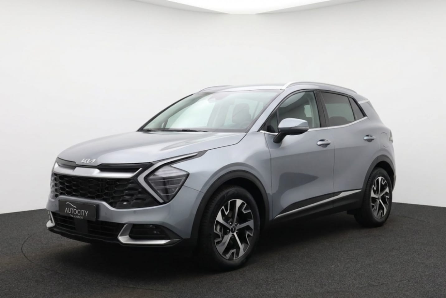 Kia Sportage - 1.6 T-GDi Hybrid 230PK DynamicPlusLine | Winterpakket | Leder/Stof | Matrix LED - AutoWereld.nl