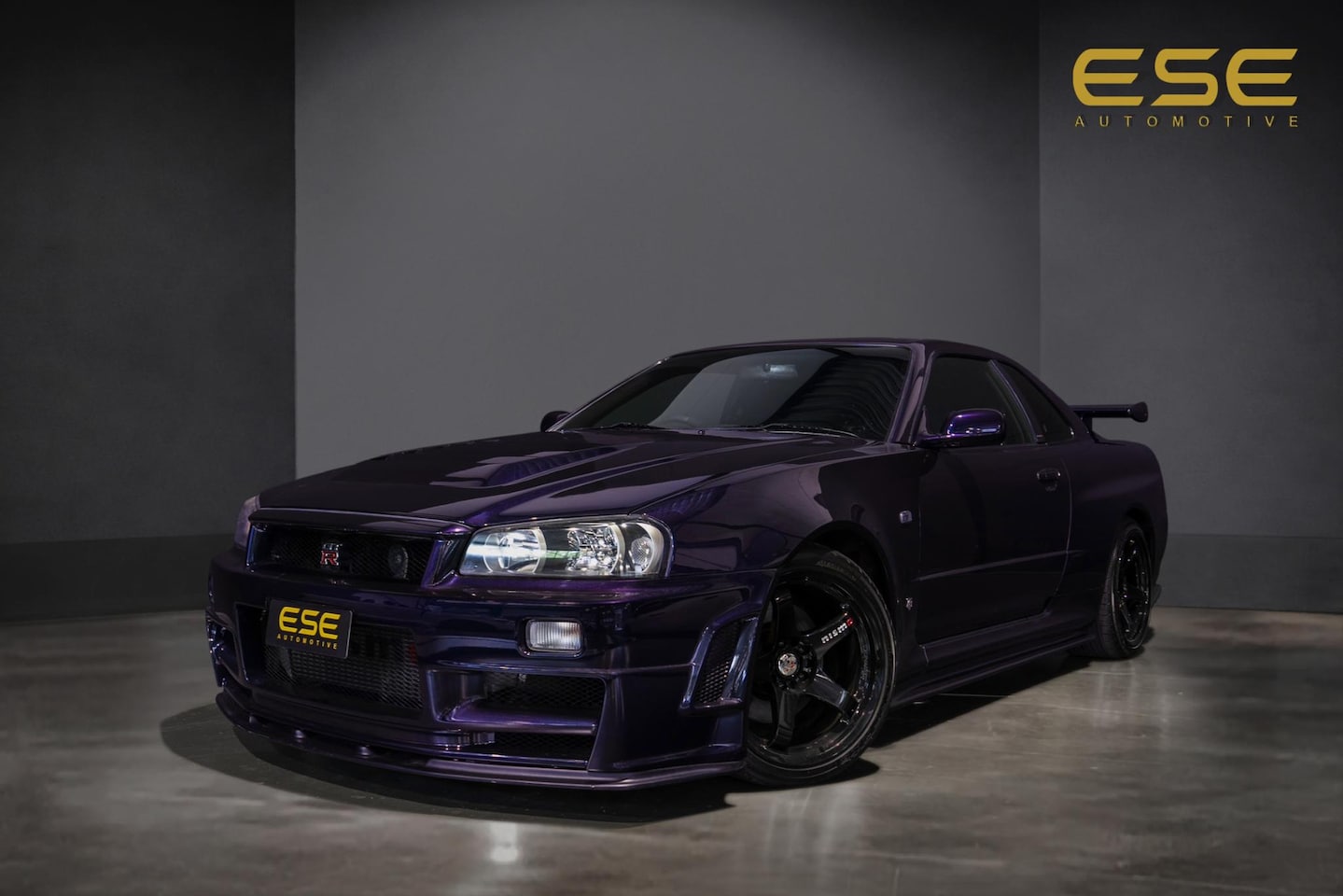 Nissan GT-R - Skyline R34 GTR V-spec Midnight Purple II - AutoWereld.nl