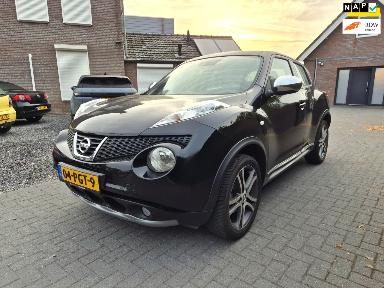 Nissan Juke - 1.6 Acenta Eco Navi Clima Cruise Trekhaak Camera - AutoWereld.nl