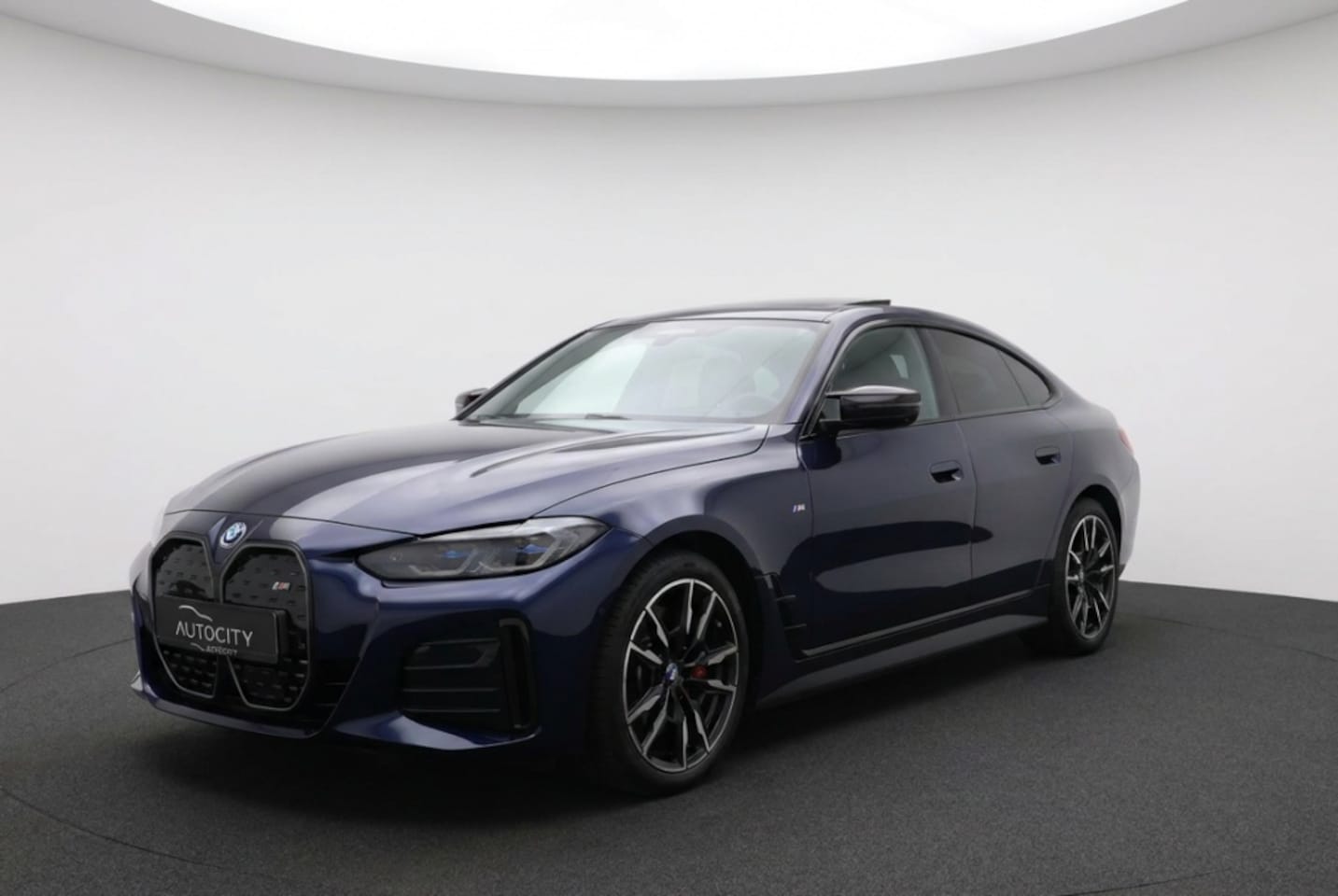 BMW i4 - M50 High Exec. M Sport Pro 544PK AWD | Pano | Laser | HK | 360° | Carbon - AutoWereld.nl