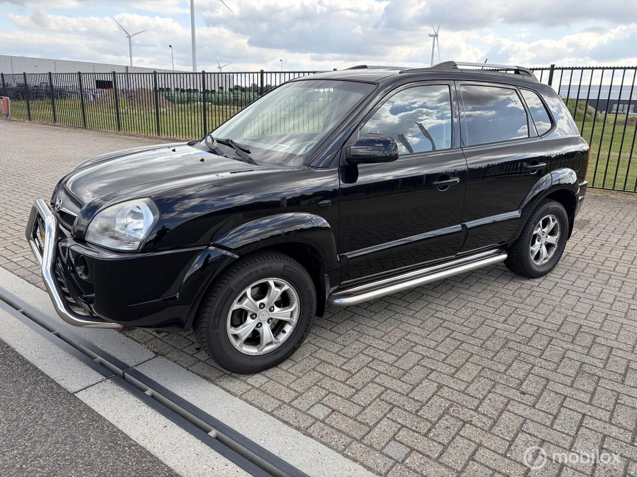 Hyundai Tucson - 2.0i Style Cross 2.0i Style Cross - AutoWereld.nl