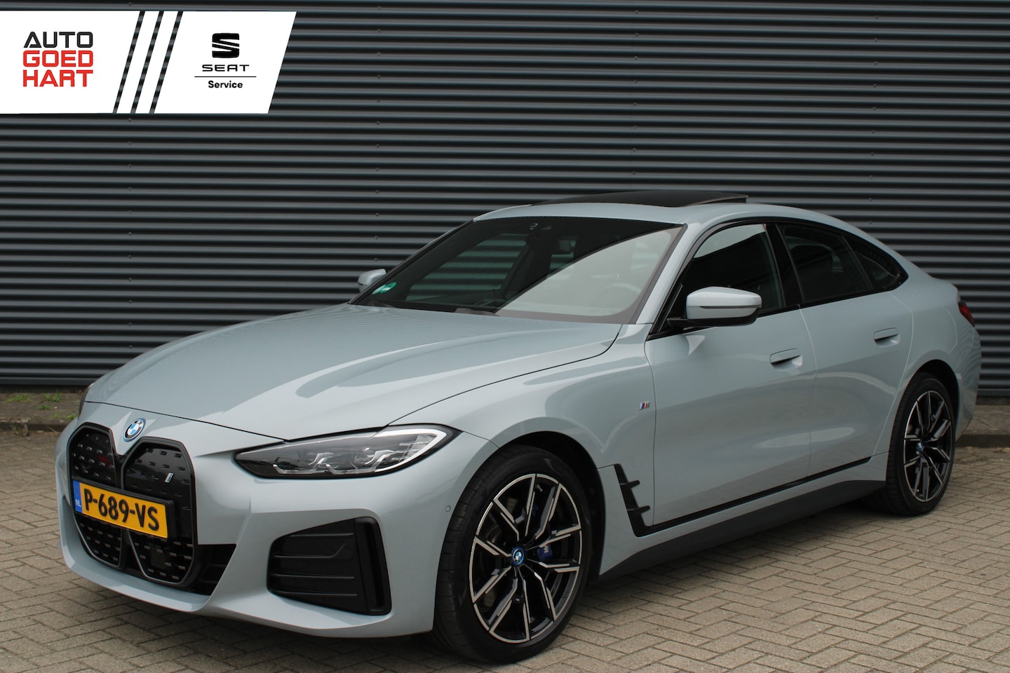 BMW i4 - eDrive40 84 kWh Schuif-/kanteldak Leer Camera Led SOH 97% - AutoWereld.nl