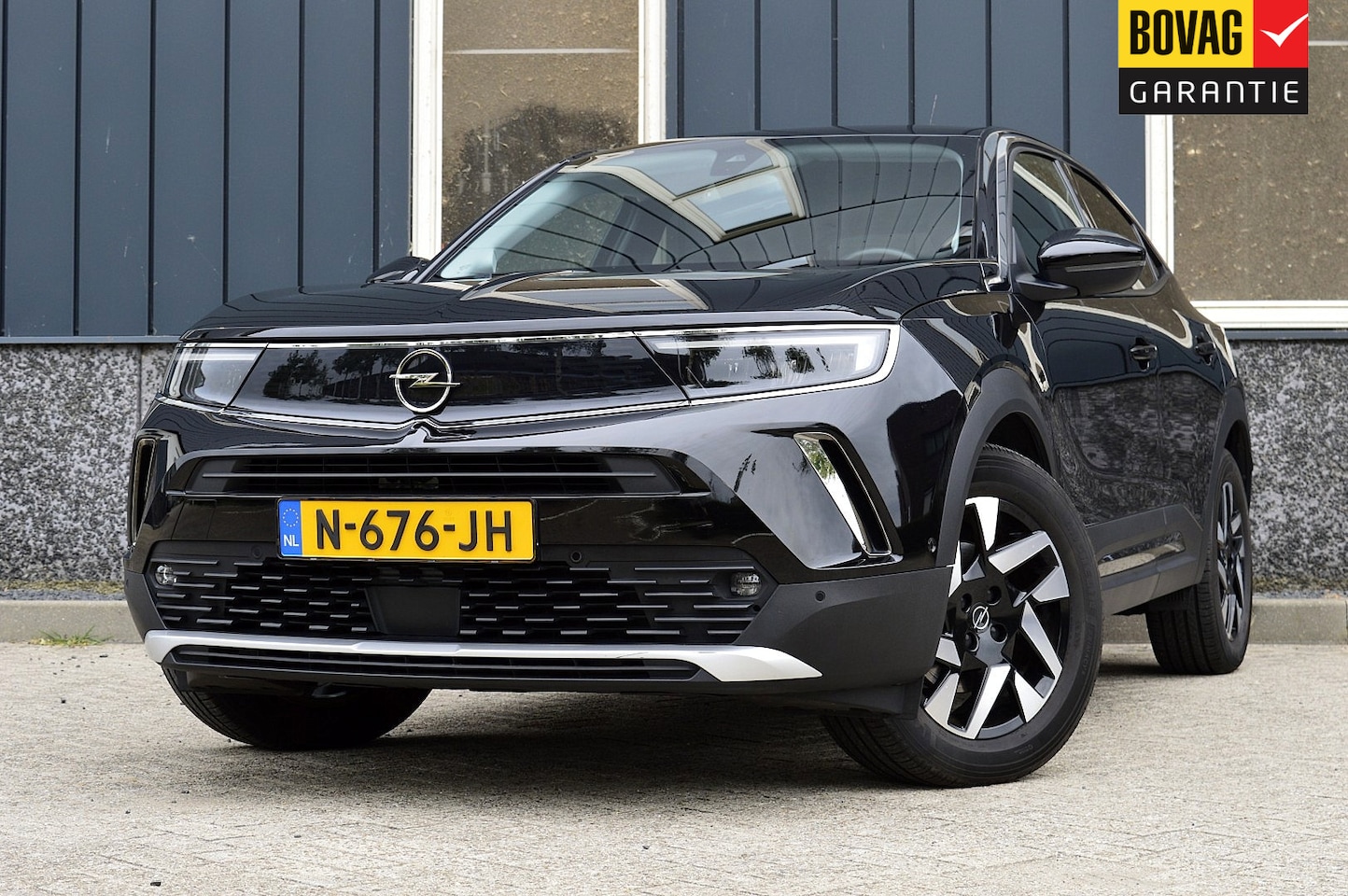 Opel Mokka-e - Business Elegance 50-kWh 11kw bl. SOH 88.94 Rijklaarprijs-Garantie Apple/Android Warmte po - AutoWereld.nl