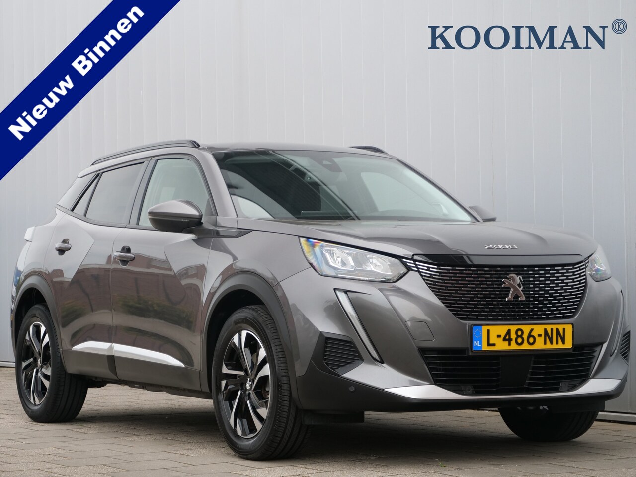 Peugeot 2008 - 1.2 PureTech Blue Lease Allure 131 Pk Navi / Apple Carplay / DAB / Camera / Trekhaak - AutoWereld.nl