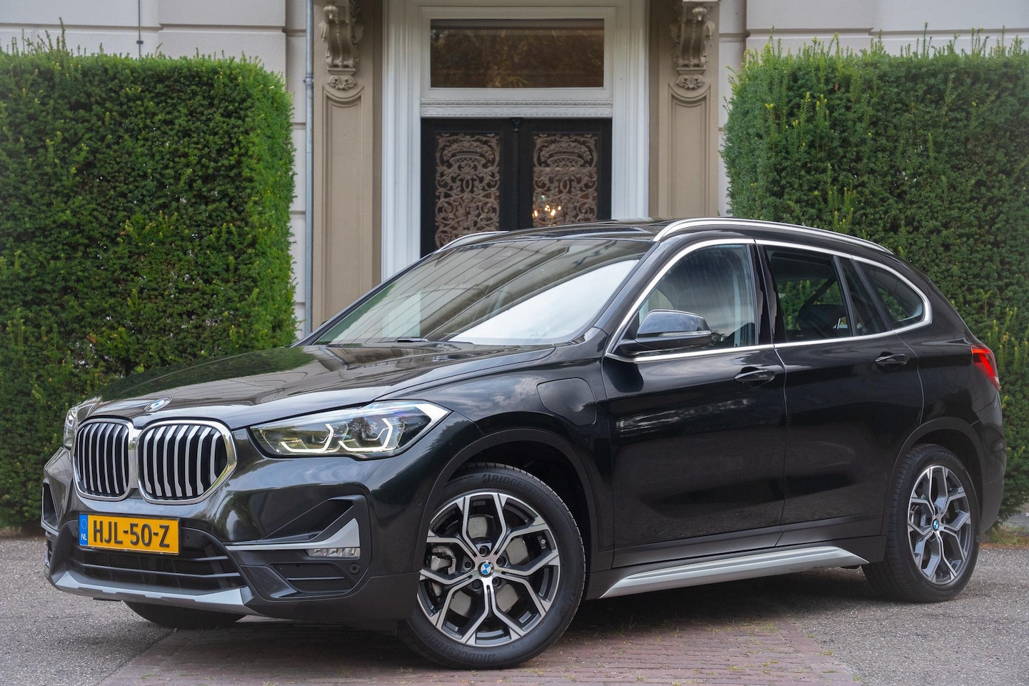 BMW X1 - xDrive25e eDrive Edition PANO | LEDER | KEYLESS | MEMORY | HUD | CARPLAY | CAMERA - AutoWereld.nl