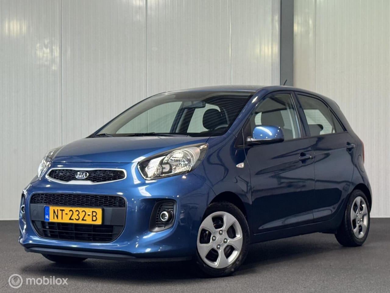Kia Picanto - 1.0 CVVT 5-drs Summer Edition [ NAP airco BT Spotify ] - AutoWereld.nl