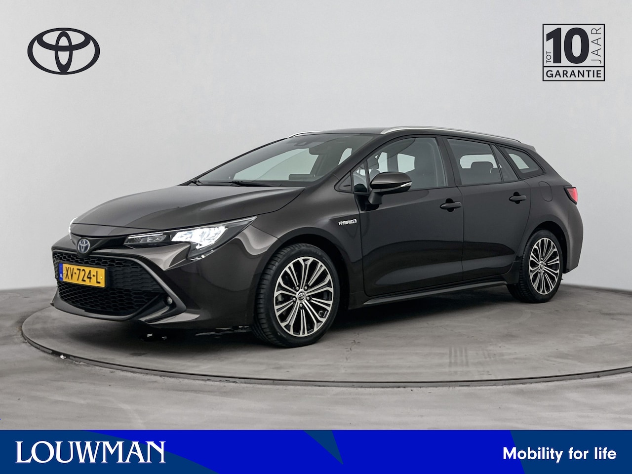 Toyota Corolla Touring Sports - 1.8 Hybrid First Edition | Afneembare Trekhaak | Metallic Lak | Navi | Lichtmetalen Velgen - AutoWereld.nl