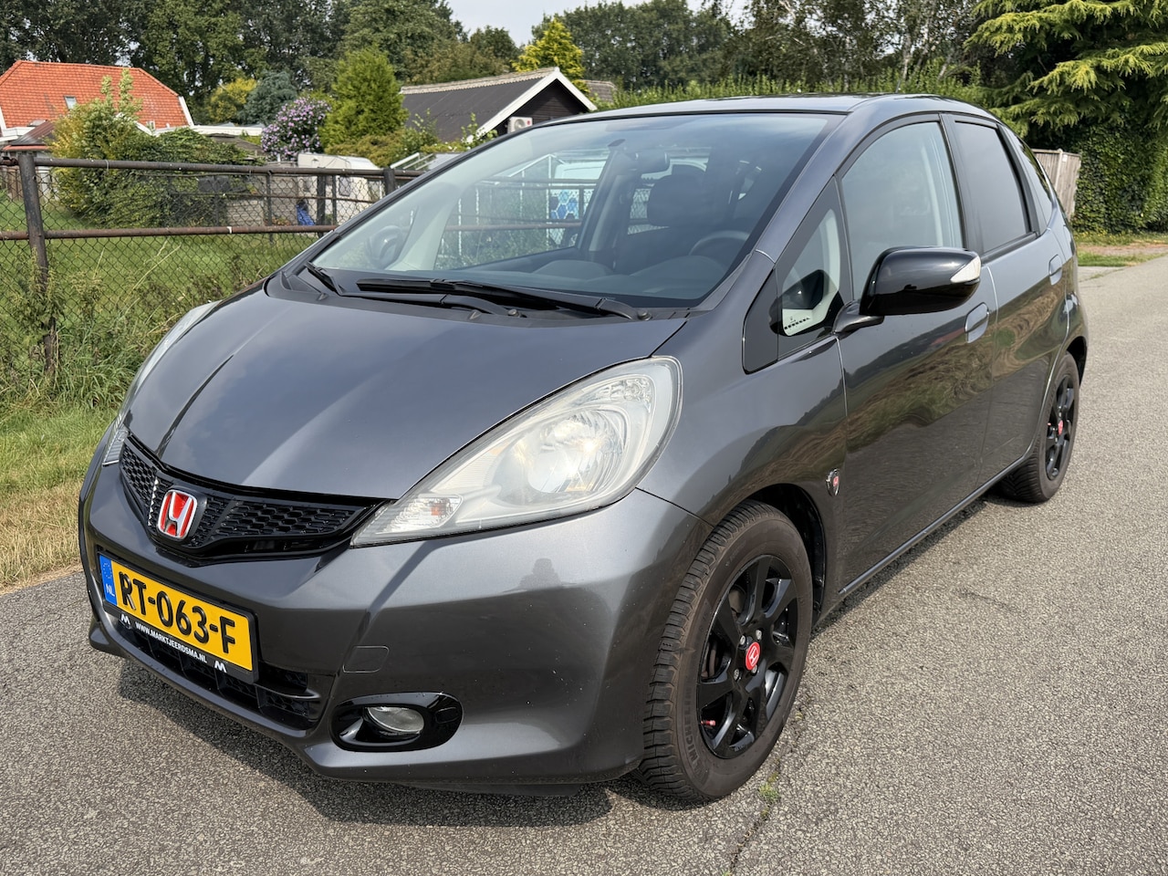 Honda Jazz - 1.4 Comfort Plus ECC/CRUISE/LMV/ 109.000km!! - AutoWereld.nl