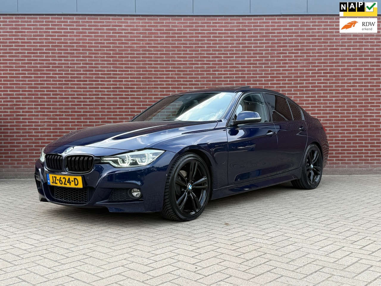 BMW 3-serie - 330e / Nap / M-pakket / Airco / Cruise / PDC / Leder bekleding - AutoWereld.nl