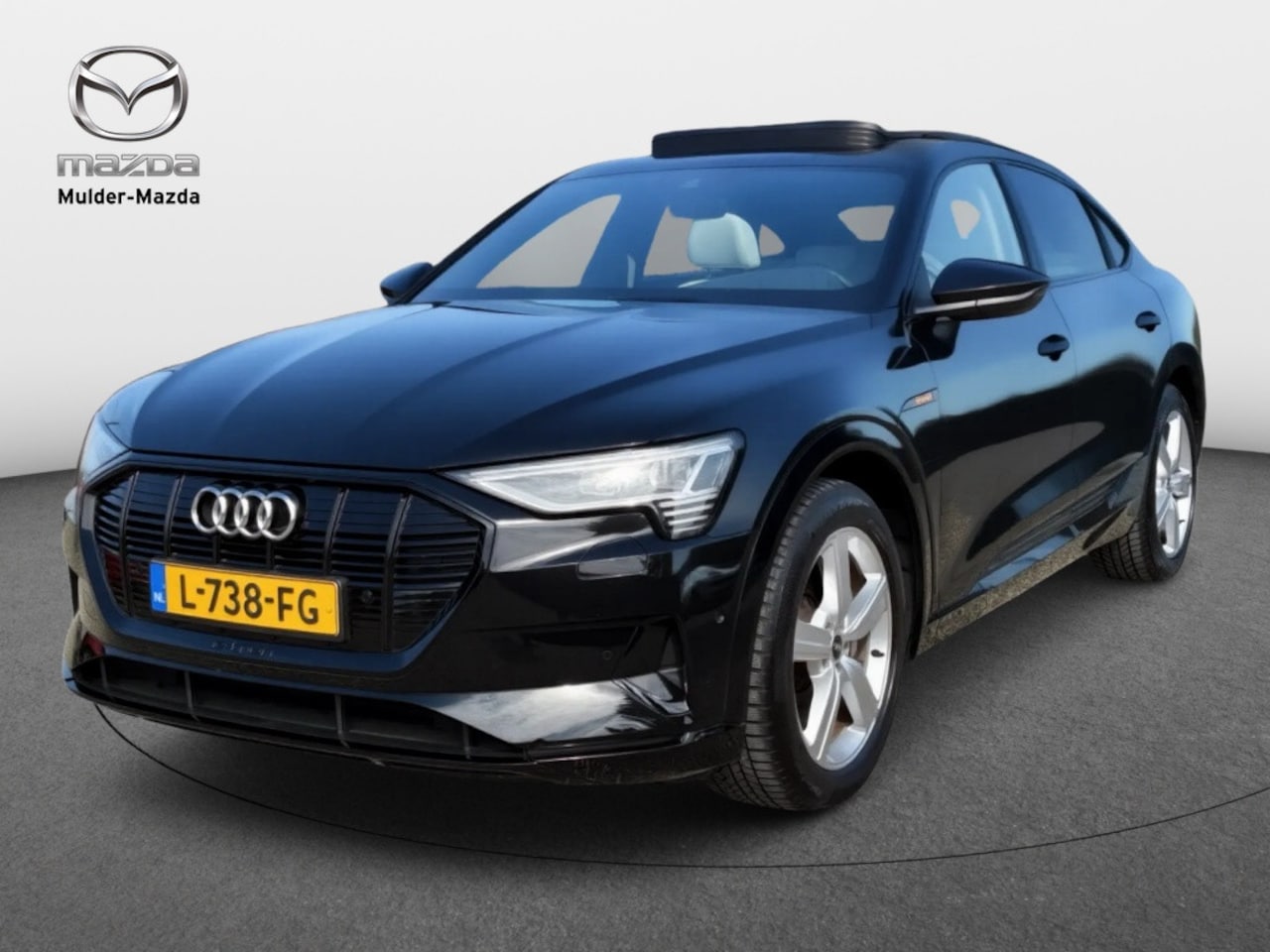 Audi e-tron Sportback - 55 quattro Business edition+ | Panoramadak | Leder | Camera - AutoWereld.nl