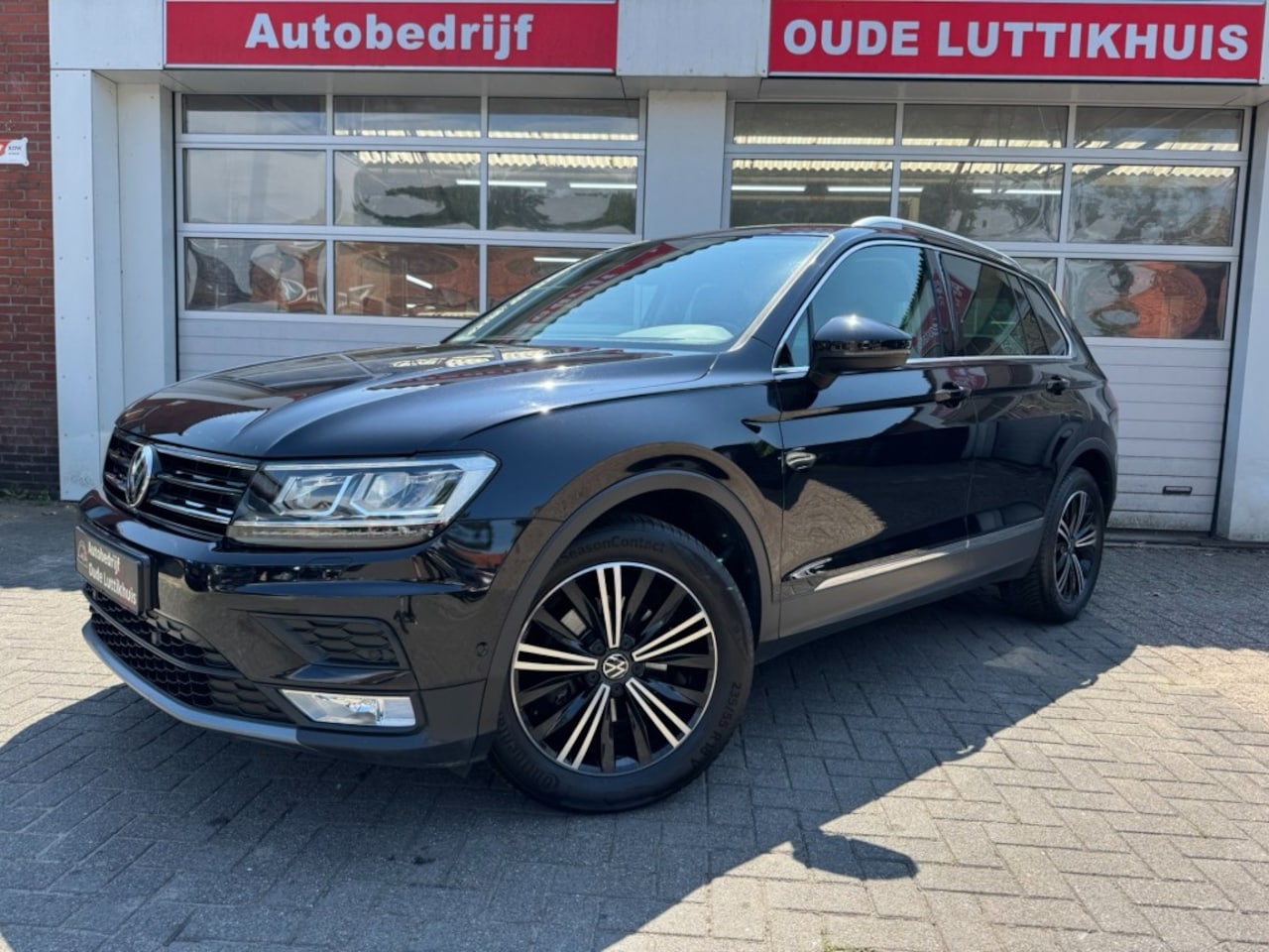 Volkswagen Tiguan - 1.4TSI 150PK Highline Full-Led Camera ACC Navi Trekhaak - AutoWereld.nl