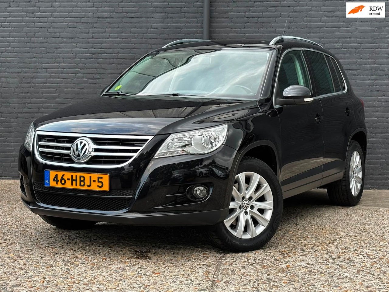Volkswagen Tiguan - 2.0 TSI Comfort&Design 4Motion PANO|TREKHAAK|NAVI|ELEK RAMEN|AIRCO - AutoWereld.nl