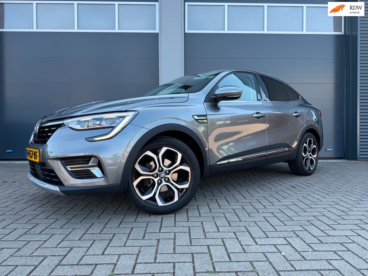 Renault Arkana - 1.6 E-Tech Hybrid 145 Intens|Dealeronderhouden|Trekhaak|All Season - AutoWereld.nl