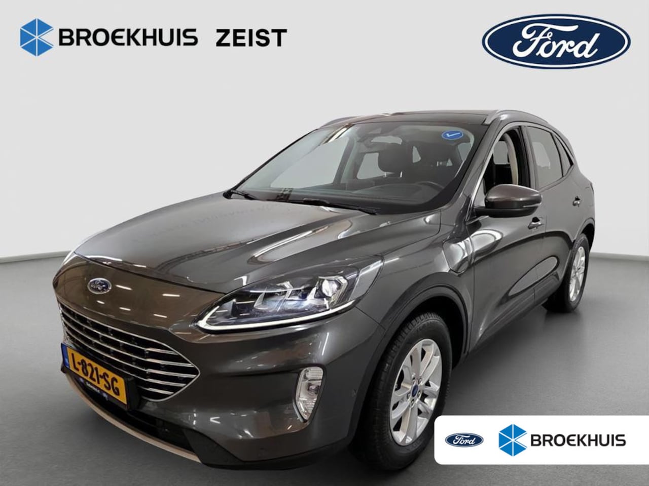 Ford Kuga - 2.5 PHEV Titanium | 100% dealer o.h. | Trekhaak | Adaptieve cruise | Standkachel | Parkeer - AutoWereld.nl