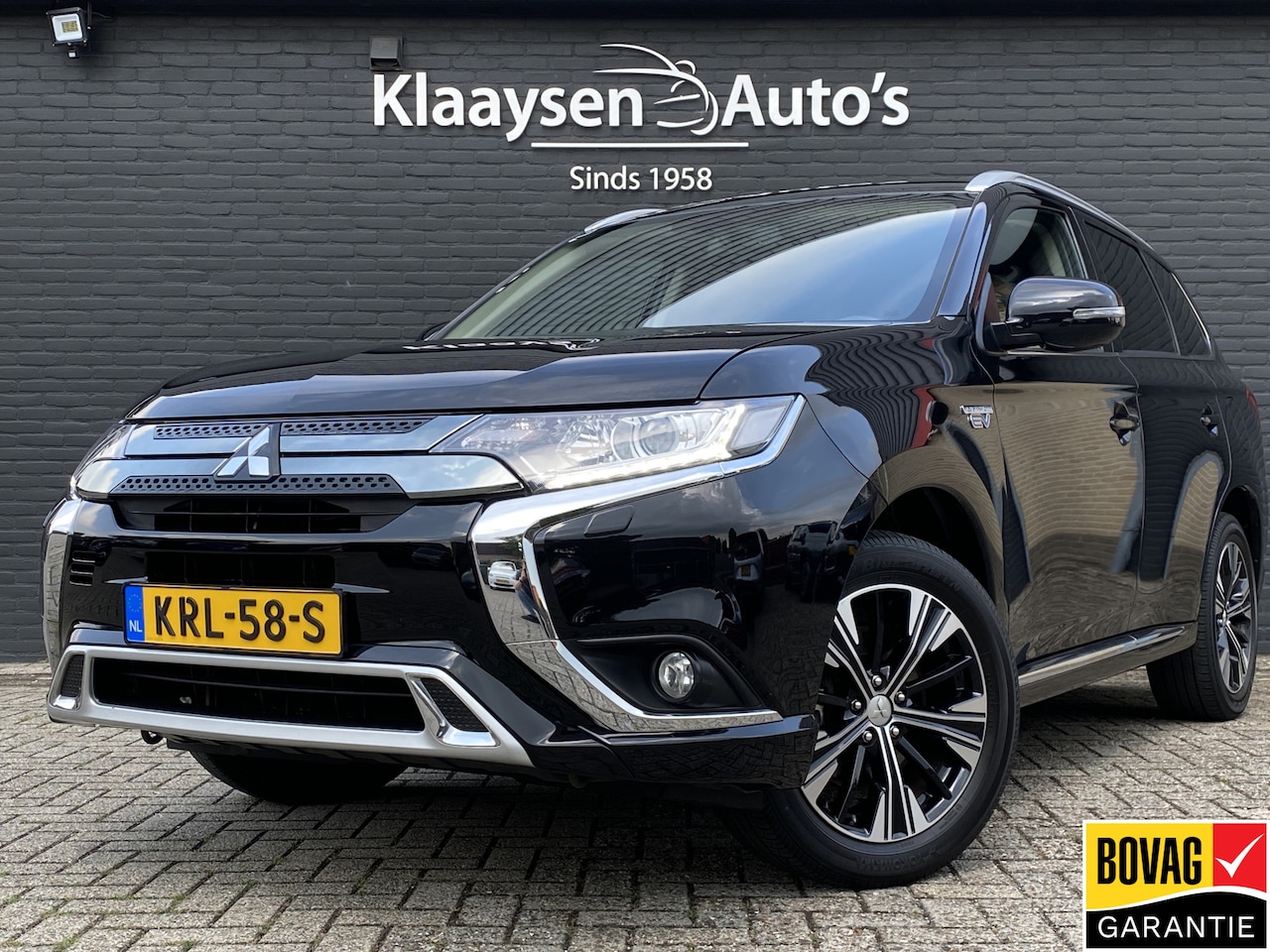 Mitsubishi Outlander - 2.4 PHEV Intense+ 4WD 225 pk AUT. | 1e eigenaar | navigatie | trekhaak | elektr. v. stoel - AutoWereld.nl