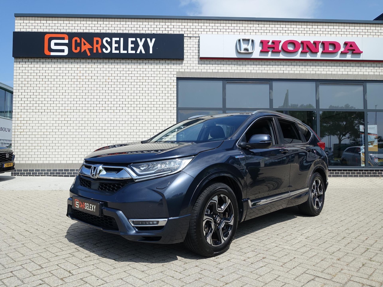 Honda CR-V - 2.0 Hybride 184pk 2WD E-CVT Lifestyle - AutoWereld.nl