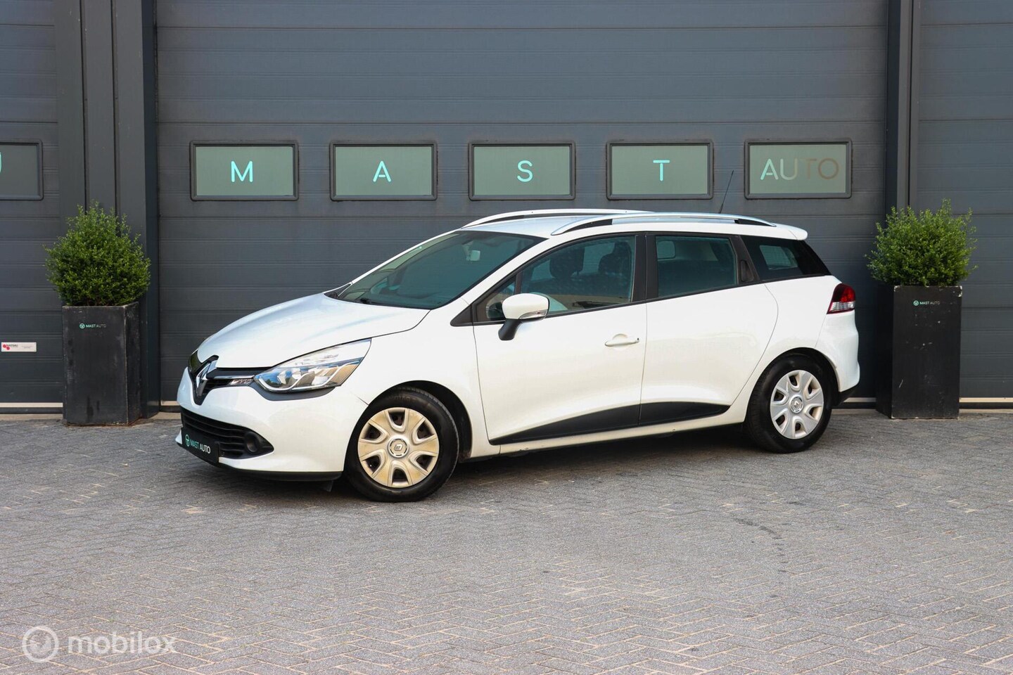 Renault Clio Estate - 1.5 dCi ECO Expression|NAP|NAVI|CRUISE|AIRCO - AutoWereld.nl