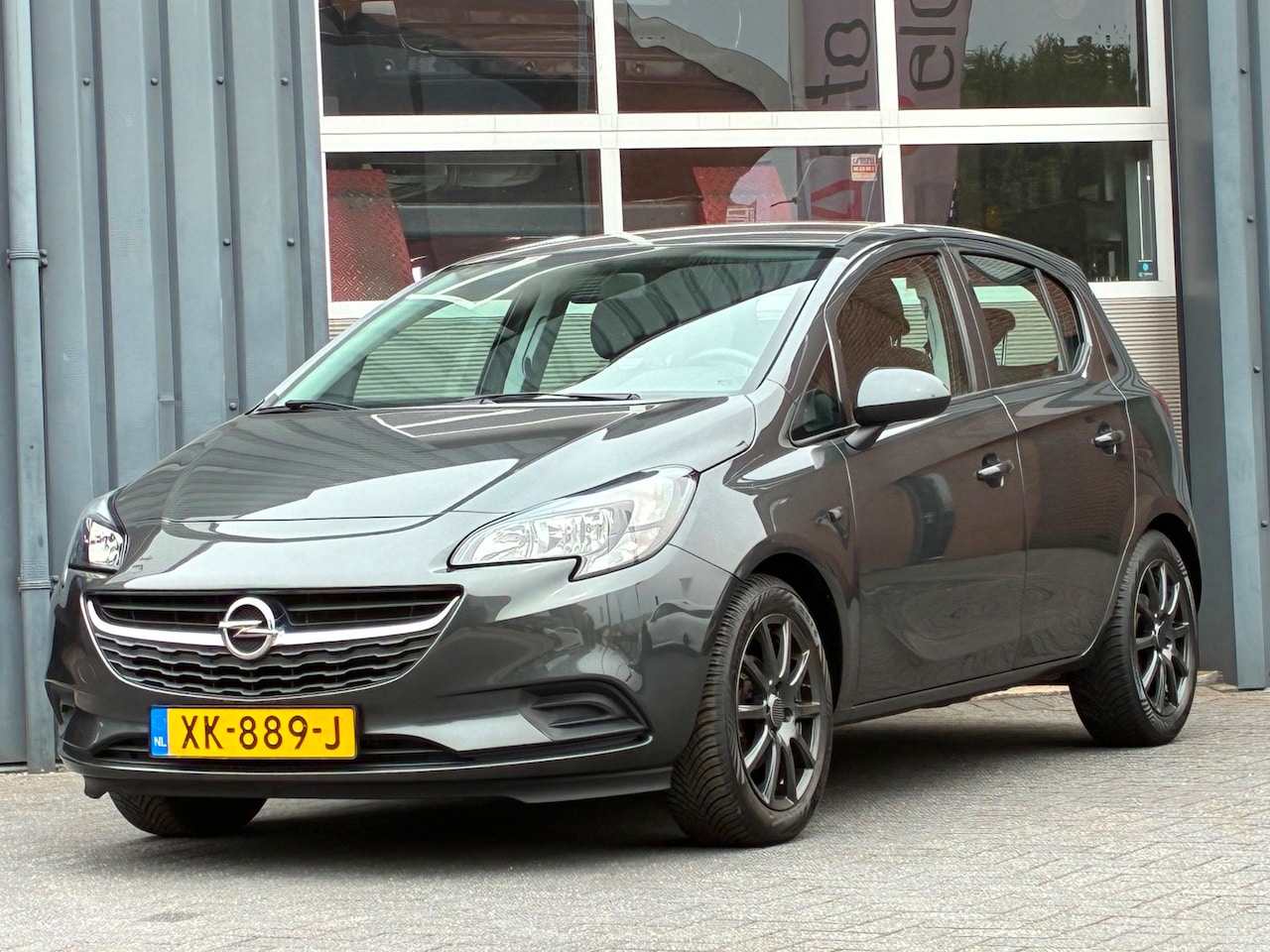 Opel Corsa - 1.4 Favourite Airco Cruise controle Trekhaak - AutoWereld.nl