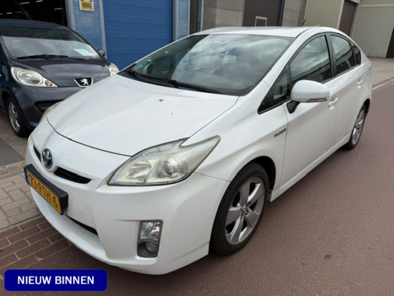 Toyota Prius - 1.8 Dynamic 2011 Navigatie NAP 279.673km Fijne Prius met boekjes en losse rekeningen. - AutoWereld.nl