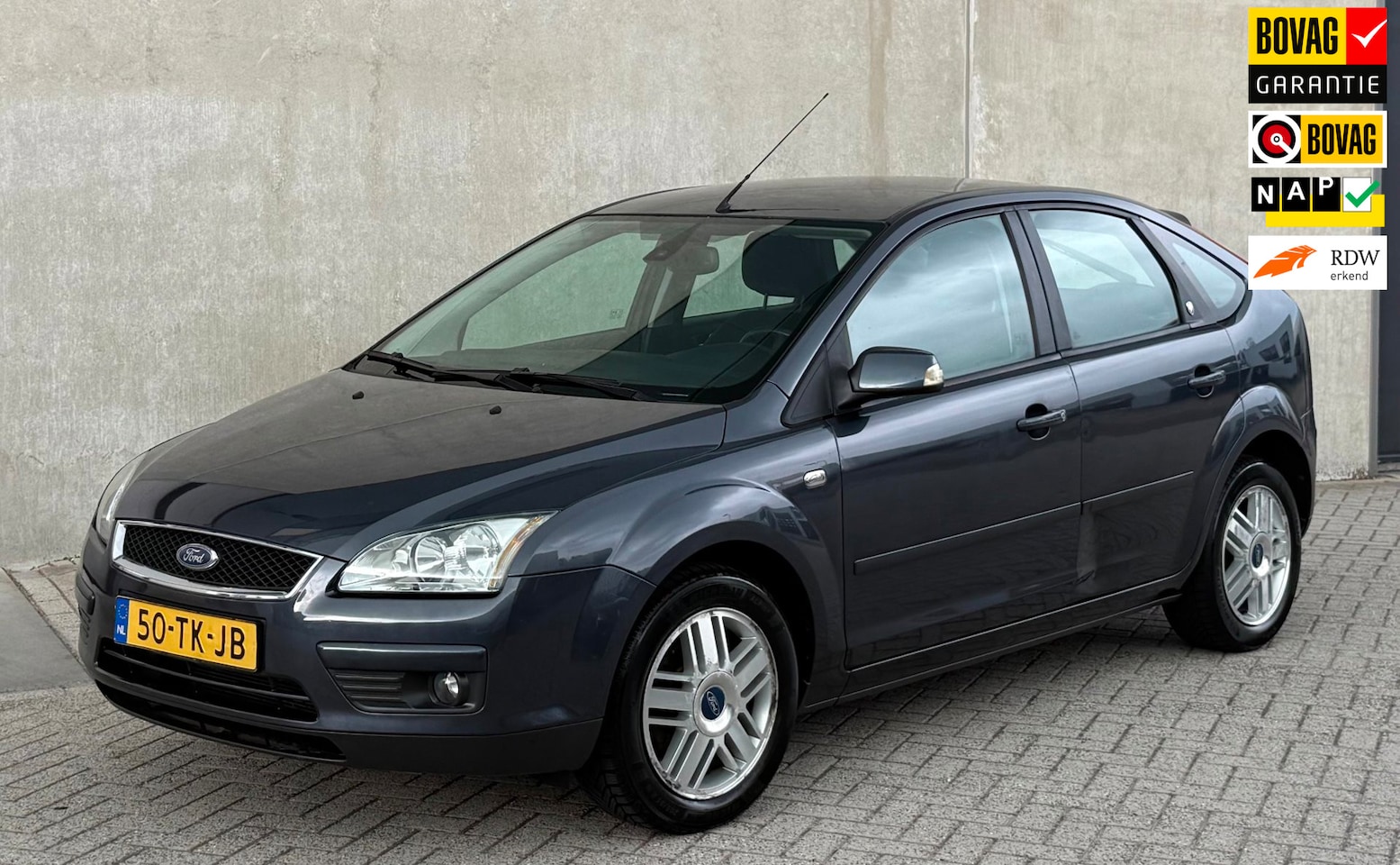 Ford Focus - 1.6-16V Ghia 2006 Grijs NAP|AIRCO|TREKHAAK - AutoWereld.nl