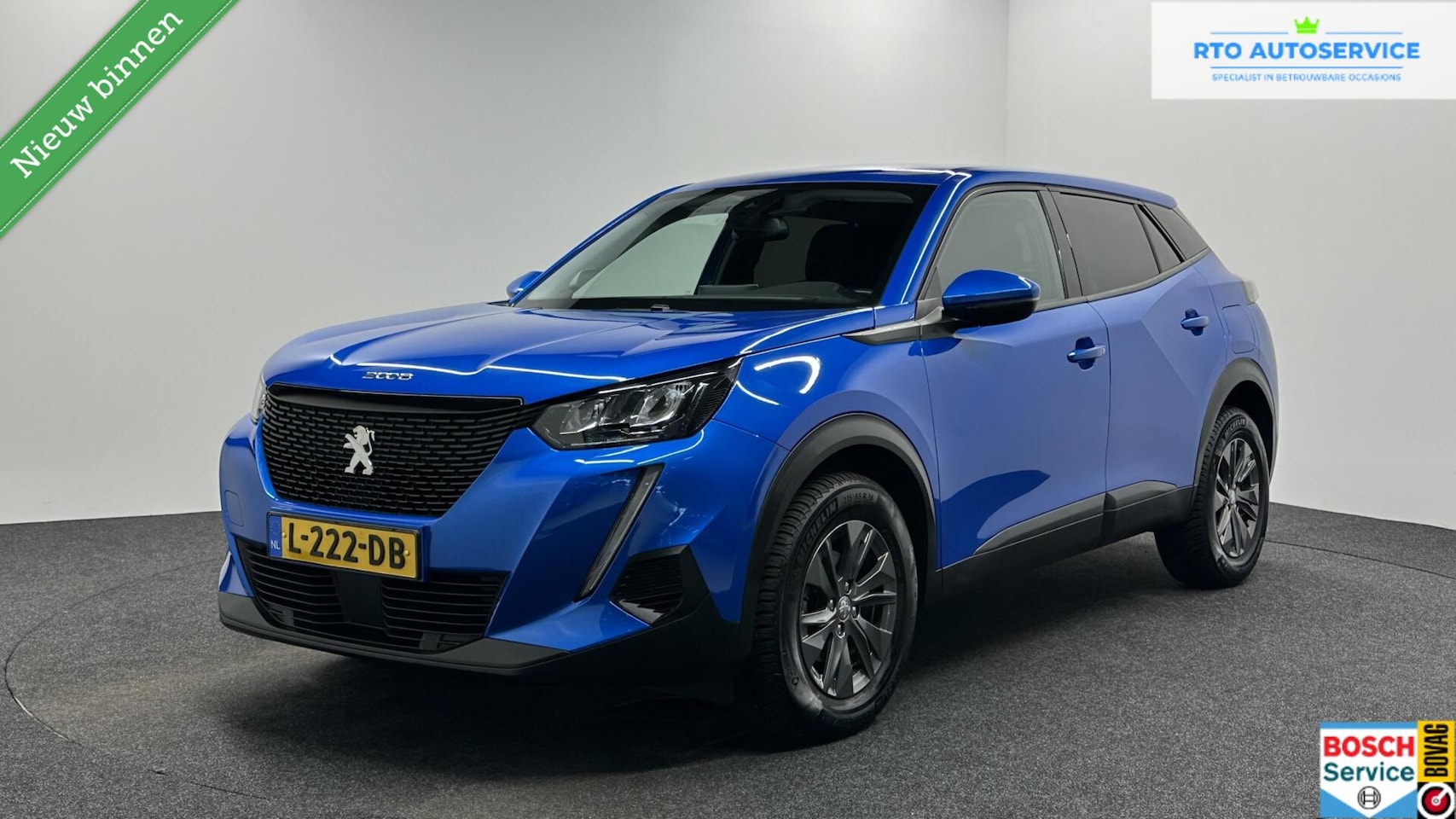 Peugeot 2008 - 1.2 PureTech Active Pack CAMERA CARPLAY NAVI CRUISE TREKHAAK. - AutoWereld.nl