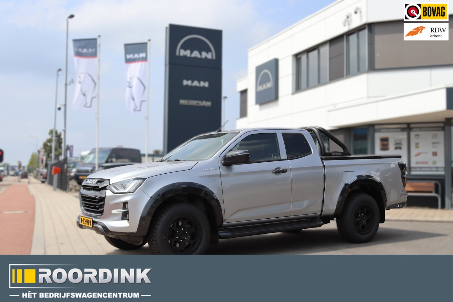 Isuzu D-Max - 1.9 Extended Cab V-Cross Zwart LM met Terrain band 3500 kg Trekhaak Rollbar - AutoWereld.nl