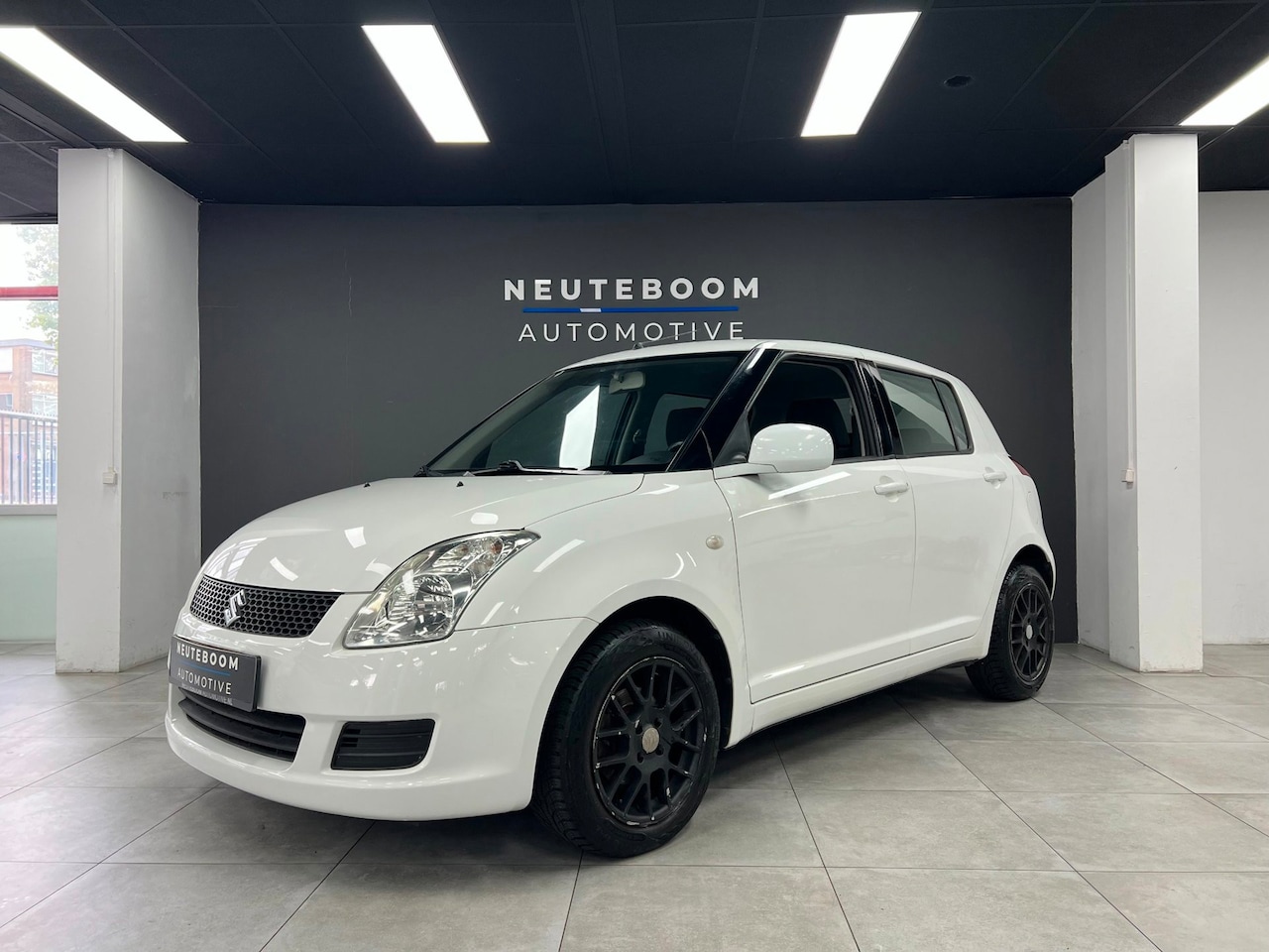 Suzuki Swift - 1.3 Base | Airco | Elekt.ramen - AutoWereld.nl